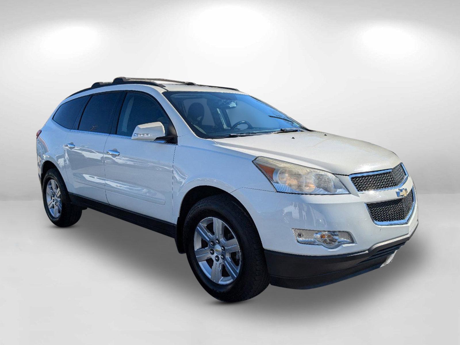 2012 /Ebony Chevrolet Traverse LT w/1LT (1GNKRGEDXCJ) with an Gas V6 3.6L/220 engine, 6-Speed Automatic transmission, located at 7000 Northlake Connector, Columbus, GA, 31904, (706) 987-8085, 32.524975, -84.978134 - 2012 Chevrolet Traverse LT w/1LT - Photo#2