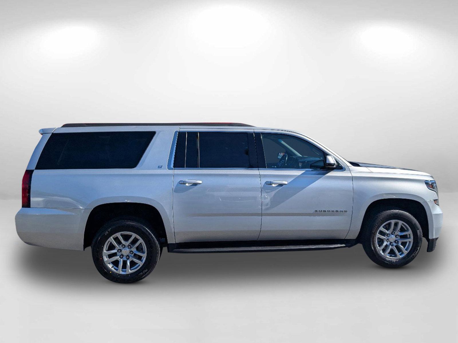 2019 /Jet Black Chevrolet Suburban LT (1GNSCHKC1KR) with an Gas/Ethanol V8 5.3L/ engine, 6-Speed Automatic transmission, located at 3959 U.S. 80 W, Phenix City, AL, 36870, (334) 297-4885, 32.469296, -85.135185 - 2019 Chevrolet Suburban LT - Photo#7