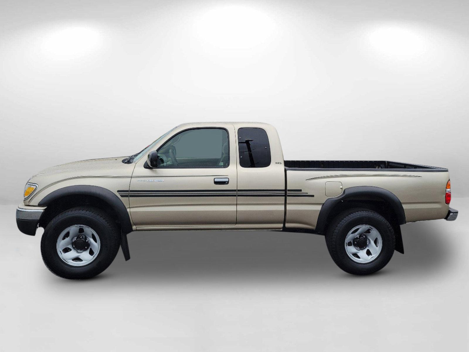 2004 Gold Toyota Tacoma PreRunner (5TESN92N34Z) with an Gas V6 3.4L/208 engine, 4-Speed Automatic w/OD transmission, located at 7000 Northlake Connector, Columbus, GA, 31904, (706) 987-8085, 32.524975, -84.978134 - 2004 Toyota Tacoma PreRunner - Photo#7