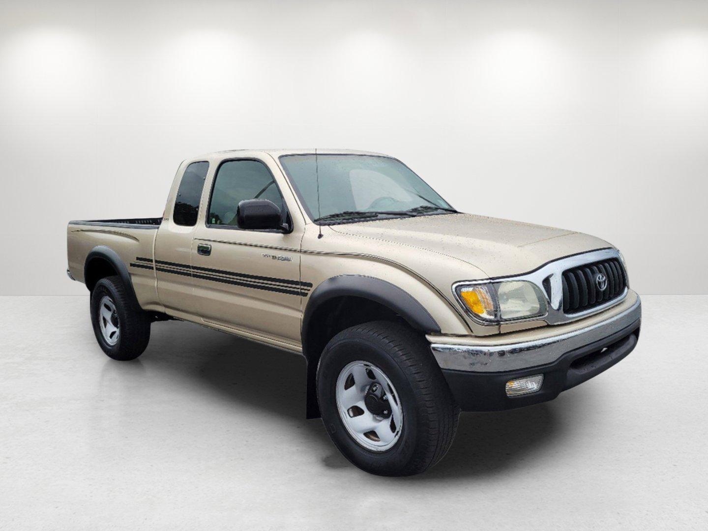 2004 Gold Toyota Tacoma PreRunner (5TESN92N34Z) with an Gas V6 3.4L/208 engine, 4-Speed Automatic w/OD transmission, located at 7000 Northlake Connector, Columbus, GA, 31904, (706) 987-8085, 32.524975, -84.978134 - 2004 Toyota Tacoma PreRunner - Photo#2