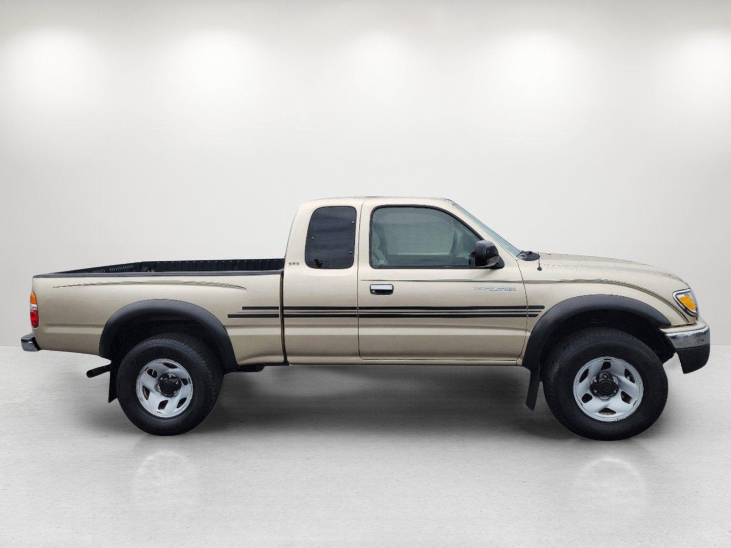 2004 Gold Toyota Tacoma PreRunner (5TESN92N34Z) with an Gas V6 3.4L/208 engine, 4-Speed Automatic w/OD transmission, located at 7000 Northlake Connector, Columbus, GA, 31904, (706) 987-8085, 32.524975, -84.978134 - 2004 Toyota Tacoma PreRunner - Photo#3