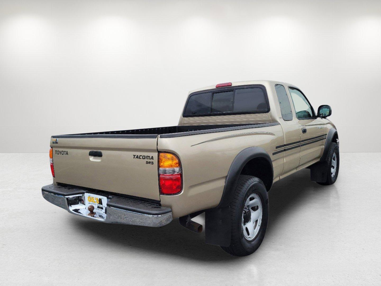 2004 Gold Toyota Tacoma PreRunner (5TESN92N34Z) with an Gas V6 3.4L/208 engine, 4-Speed Automatic w/OD transmission, located at 7000 Northlake Connector, Columbus, GA, 31904, (706) 987-8085, 32.524975, -84.978134 - 2004 Toyota Tacoma PreRunner - Photo#4