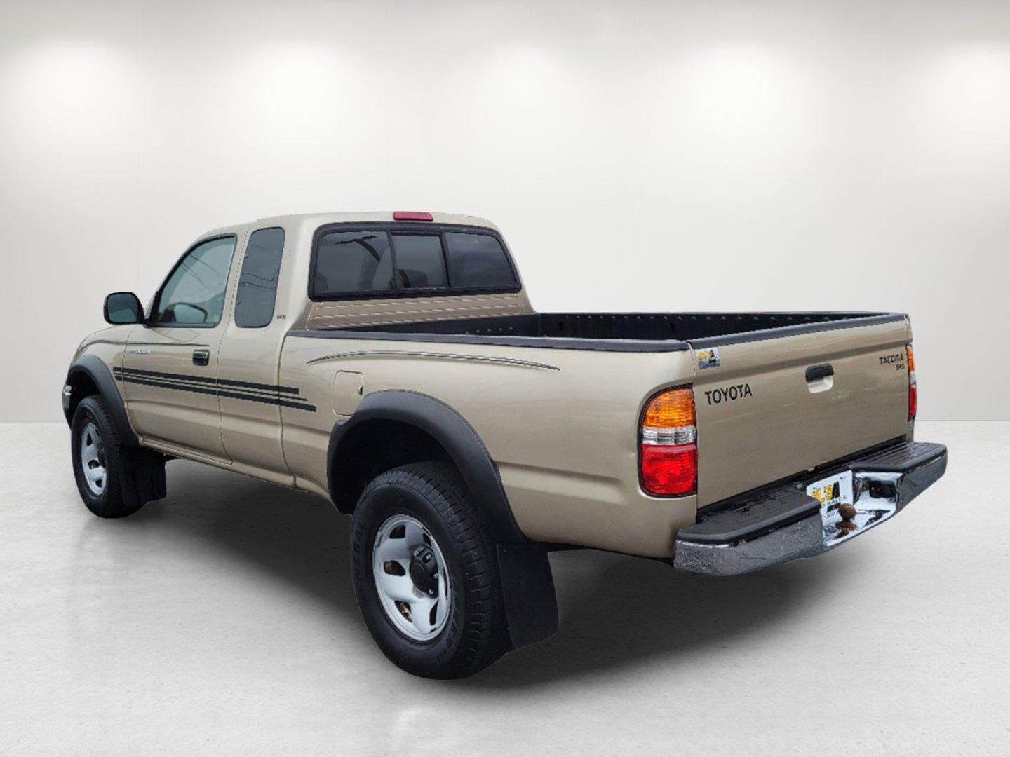 2004 Gold Toyota Tacoma PreRunner (5TESN92N34Z) with an Gas V6 3.4L/208 engine, 4-Speed Automatic w/OD transmission, located at 7000 Northlake Connector, Columbus, GA, 31904, (706) 987-8085, 32.524975, -84.978134 - 2004 Toyota Tacoma PreRunner - Photo#6