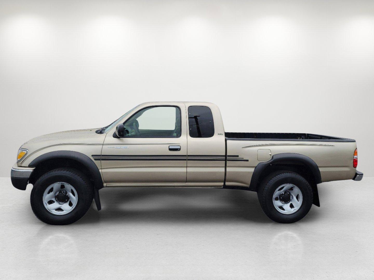 2004 Gold Toyota Tacoma PreRunner (5TESN92N34Z) with an Gas V6 3.4L/208 engine, 4-Speed Automatic w/OD transmission, located at 7000 Northlake Connector, Columbus, GA, 31904, (706) 987-8085, 32.524975, -84.978134 - 2004 Toyota Tacoma PreRunner - Photo#7