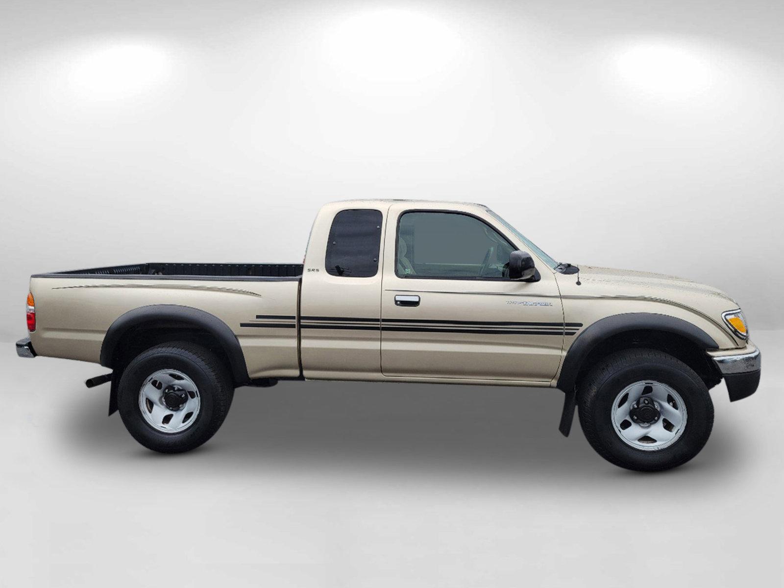 2004 Gold Toyota Tacoma PreRunner (5TESN92N34Z) with an Gas V6 3.4L/208 engine, 4-Speed Automatic w/OD transmission, located at 7000 Northlake Connector, Columbus, GA, 31904, (706) 987-8085, 32.524975, -84.978134 - 2004 Toyota Tacoma PreRunner - Photo#3