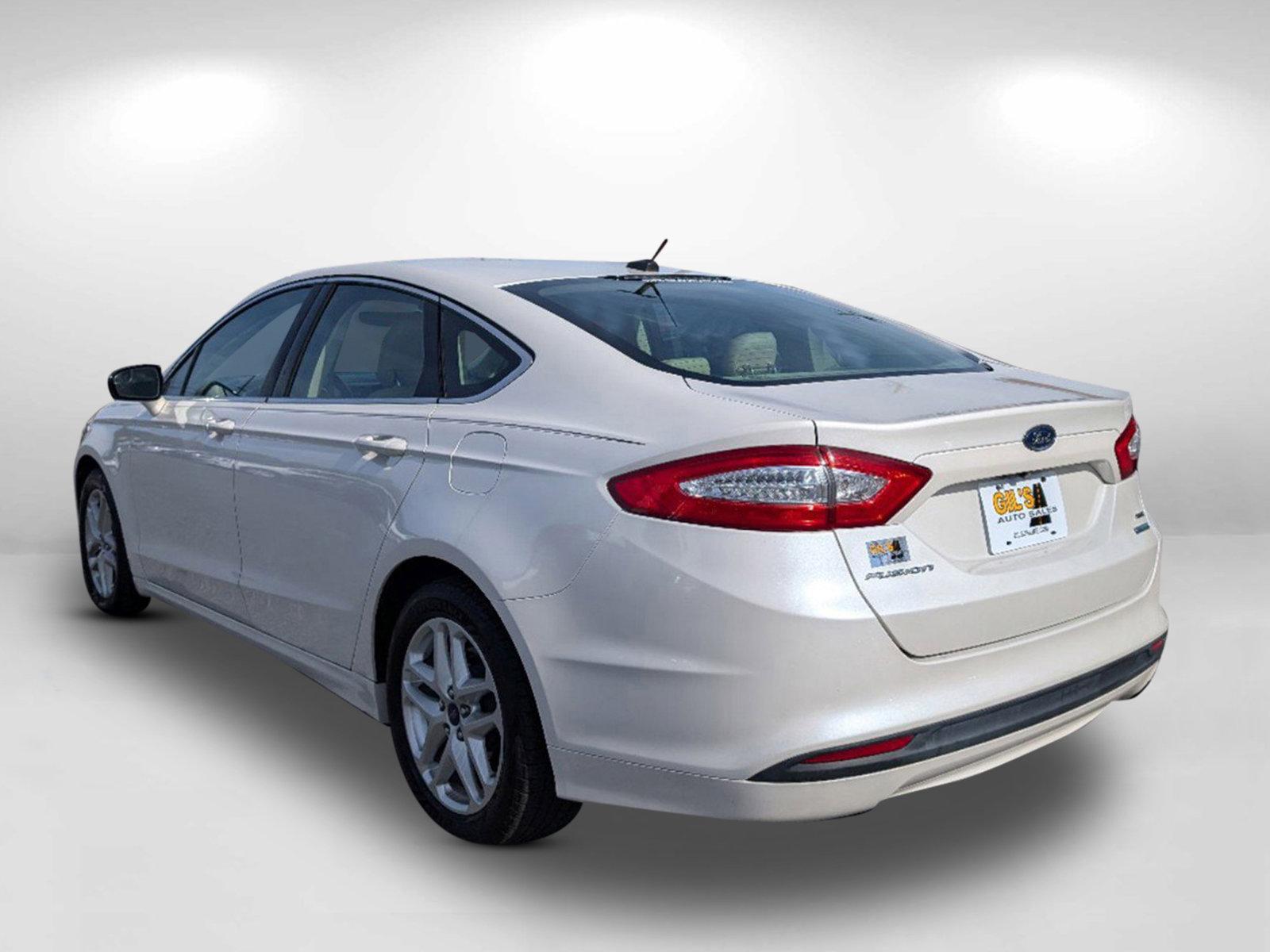 2014 Ford Fusion SE (3FA6P0HD2ER) with an Intercooled Turbo Regular Unleaded I-4 1.5 L/91 engine, located at 5115 14th Ave., Columbus, GA, 31904, (706) 323-0345, 32.511494, -84.971046 - 2014 Ford Fusion SE - Photo#6