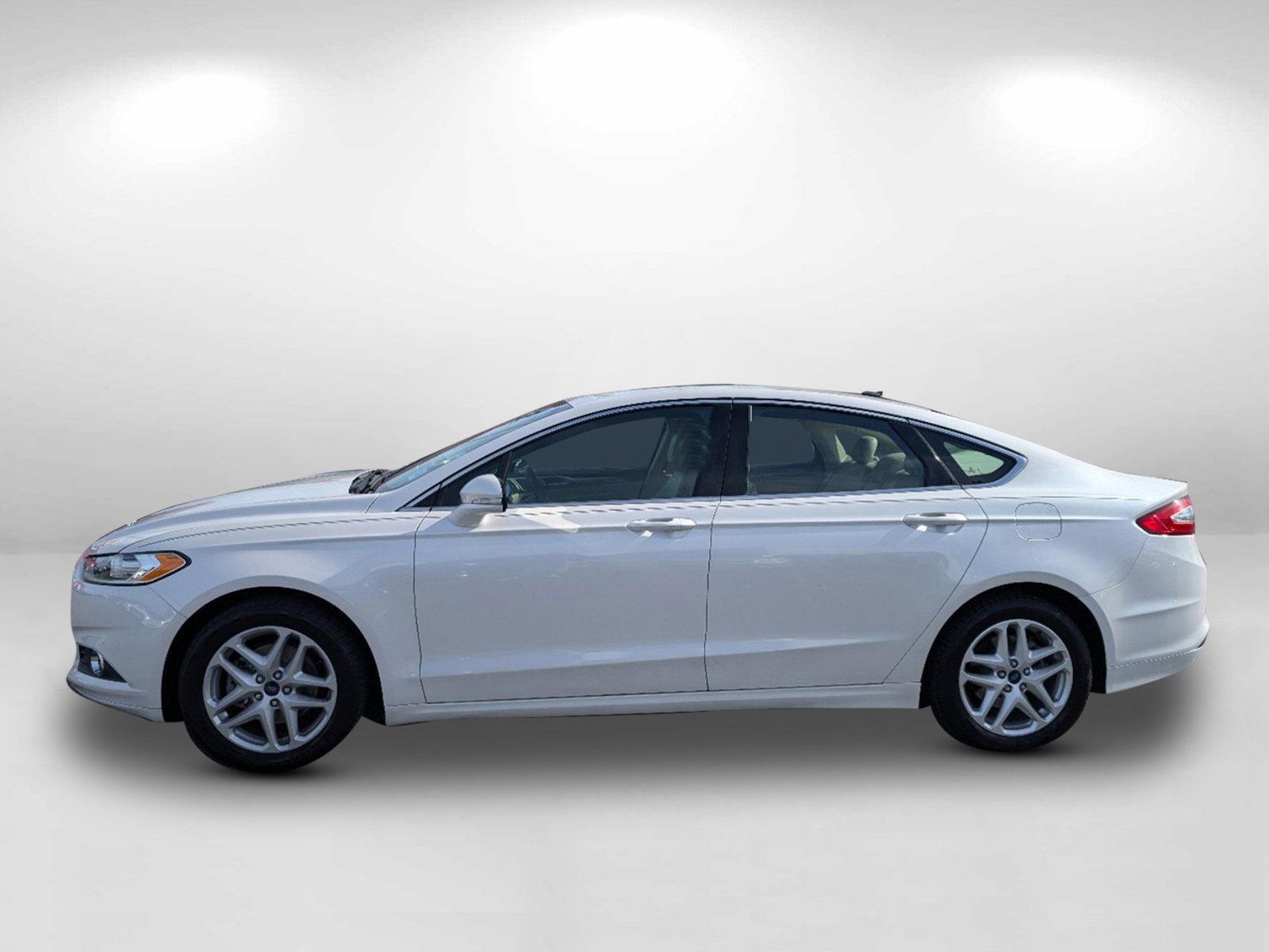 2014 Ford Fusion SE (3FA6P0HD2ER) with an Intercooled Turbo Regular Unleaded I-4 1.5 L/91 engine, located at 5115 14th Ave., Columbus, GA, 31904, (706) 323-0345, 32.511494, -84.971046 - 2014 Ford Fusion SE - Photo#7