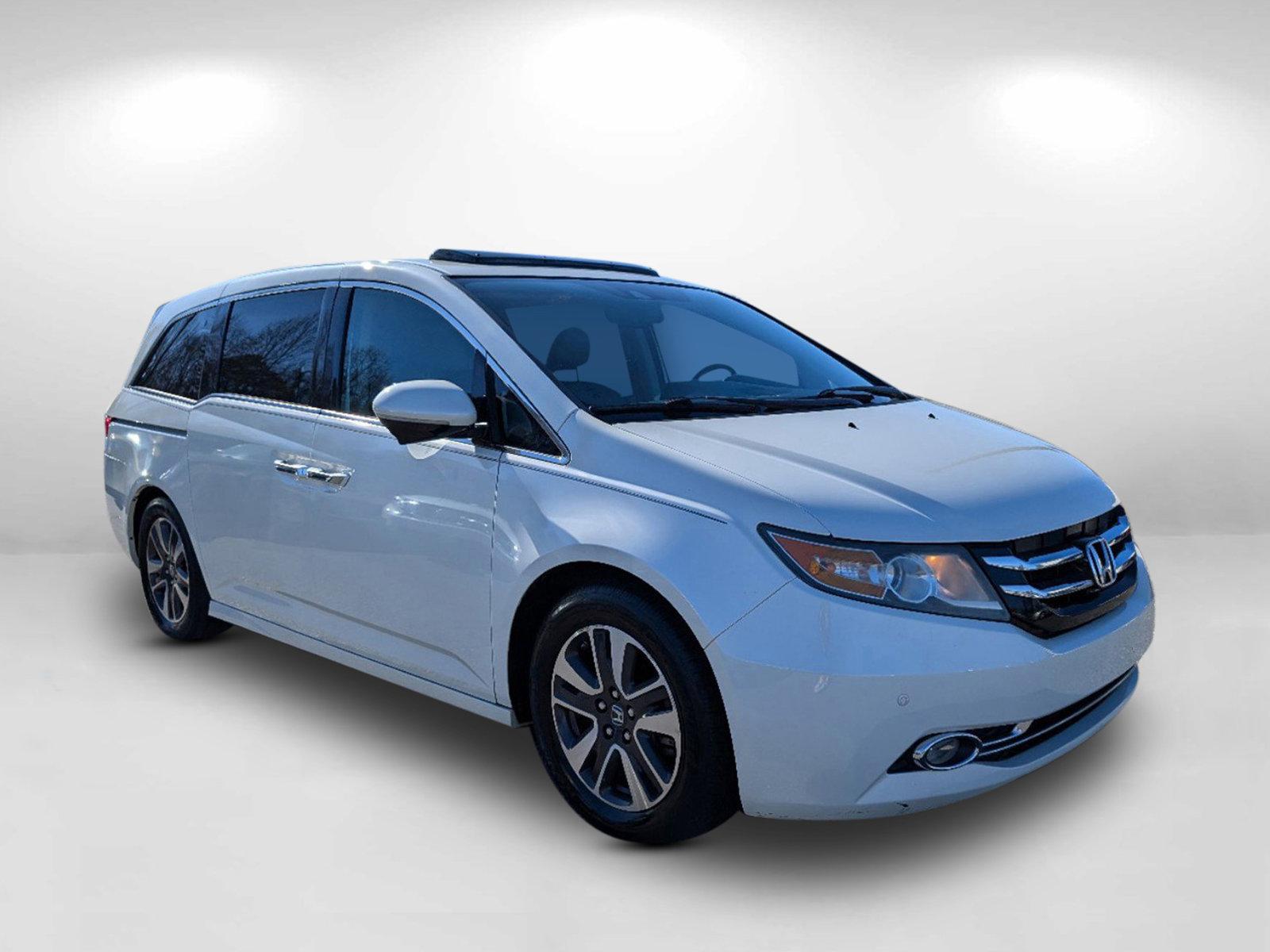 2014 Honda Odyssey Touring Elite (5FNRL5H92EB) with an Regular Unleaded V-6 3.5 L/212 engine, 6-Speed Automatic w/OD transmission, located at 3959 U.S. 80 W, Phenix City, AL, 36870, (334) 297-4885, 32.469296, -85.135185 - 2014 Honda Odyssey Touring Elite - Photo#7