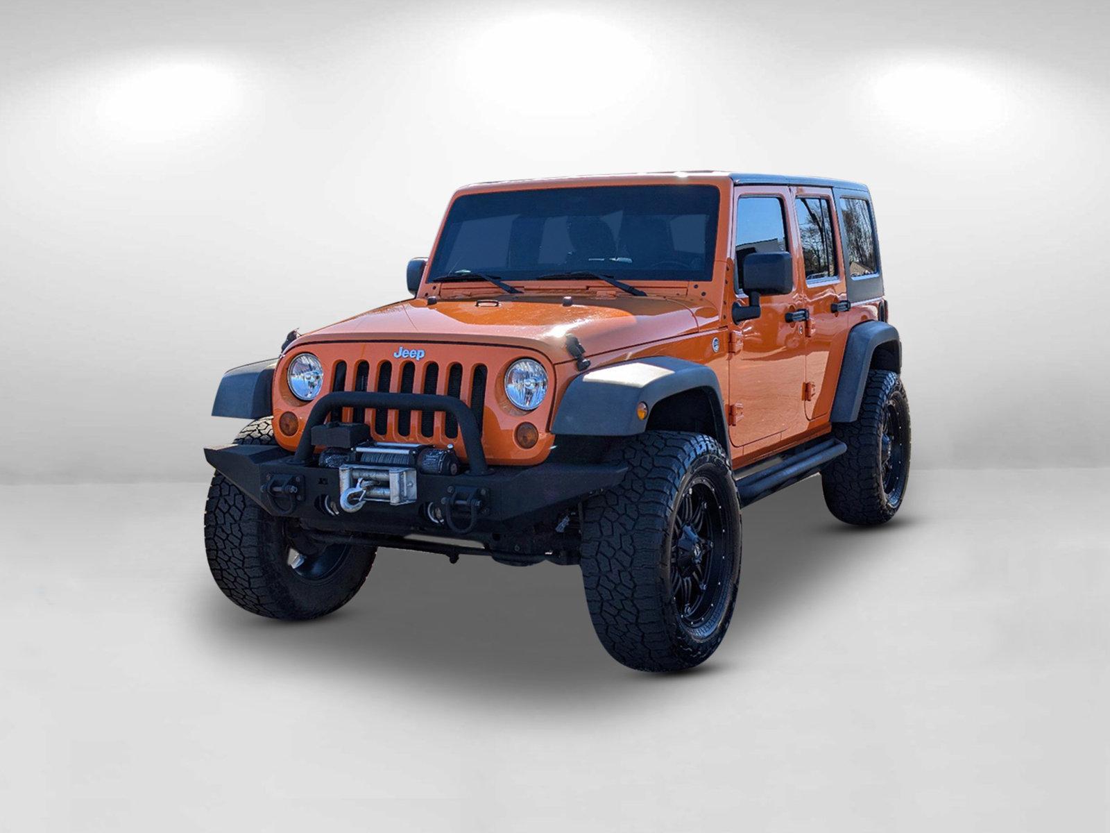 2012 /Black Interior Jeep Wrangler Unlimited Sport (1C4BJWDG0CL) with an Gas V6 3.6L/220 engine, 6-Speed Manual transmission, located at 3959 U.S. 80 W, Phenix City, AL, 36870, (334) 297-4885, 32.469296, -85.135185 - 2012 Jeep Wrangler Unlimited Sport - Photo#3