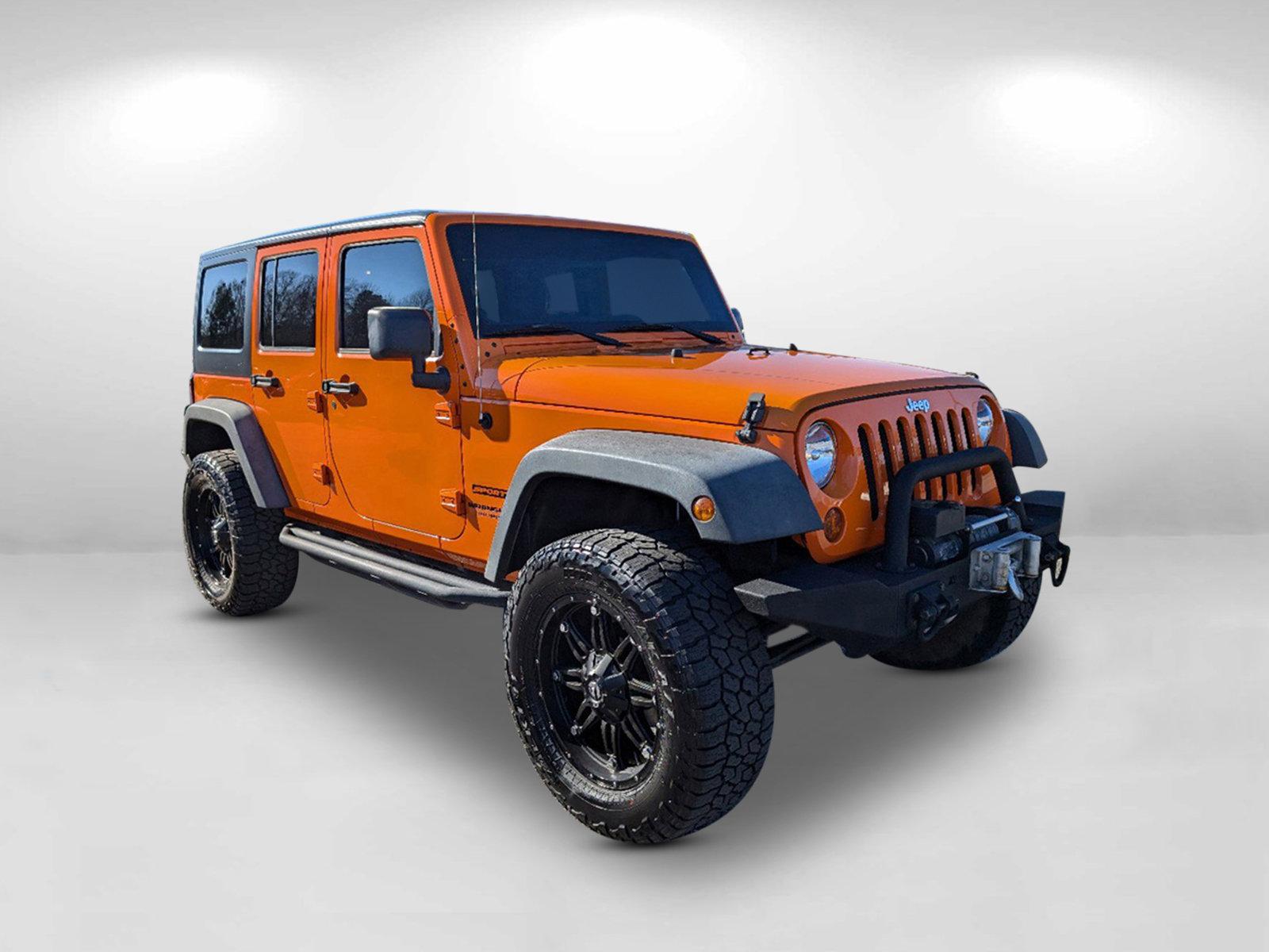 2012 /Black Interior Jeep Wrangler Unlimited Sport (1C4BJWDG0CL) with an Gas V6 3.6L/220 engine, 6-Speed Manual transmission, located at 3959 U.S. 80 W, Phenix City, AL, 36870, (334) 297-4885, 32.469296, -85.135185 - 2012 Jeep Wrangler Unlimited Sport - Photo#5