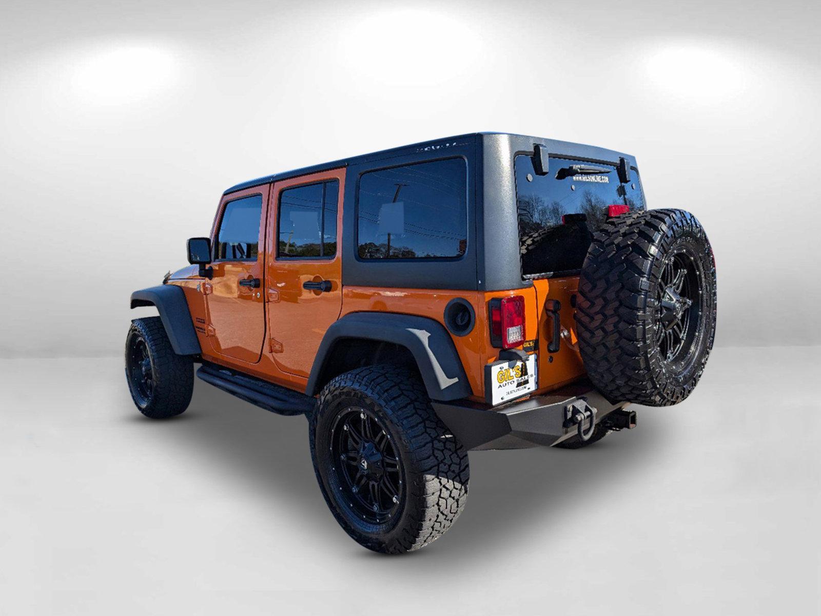 2012 /Black Interior Jeep Wrangler Unlimited Sport (1C4BJWDG0CL) with an Gas V6 3.6L/220 engine, 6-Speed Manual transmission, located at 3959 U.S. 80 W, Phenix City, AL, 36870, (334) 297-4885, 32.469296, -85.135185 - 2012 Jeep Wrangler Unlimited Sport - Photo#9