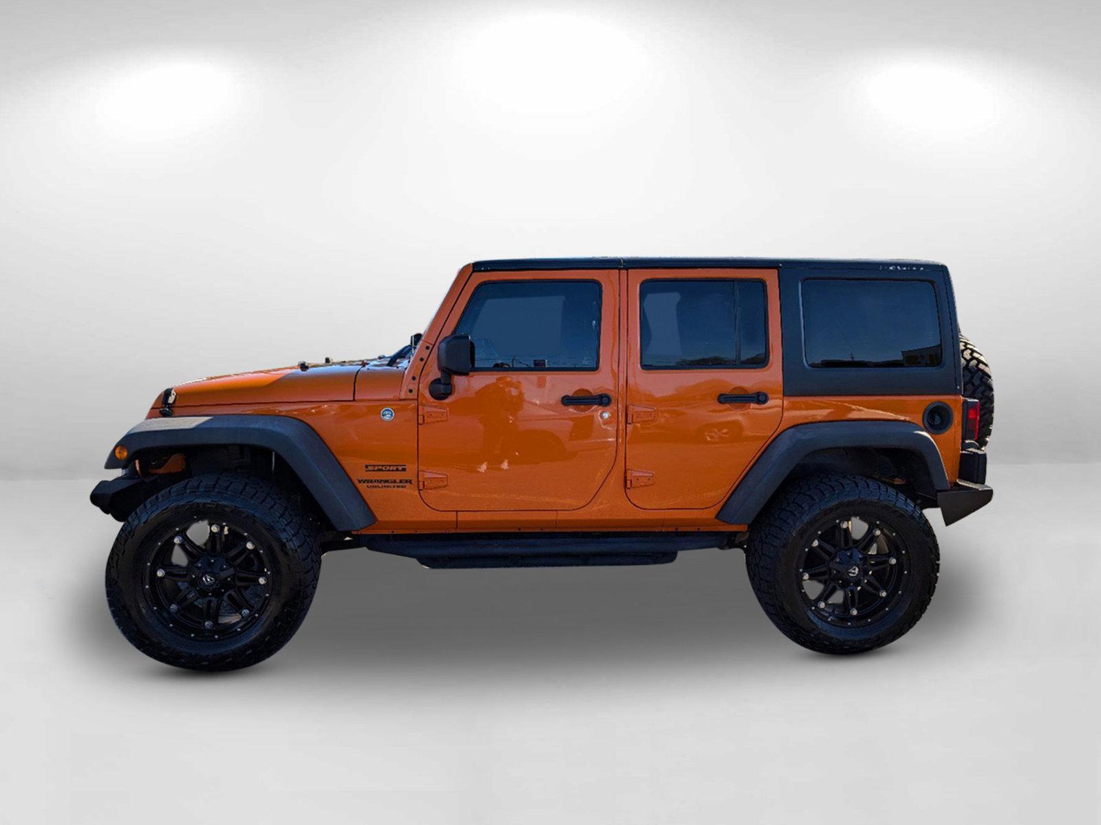 2012 /Black Interior Jeep Wrangler Unlimited Sport (1C4BJWDG0CL) with an Gas V6 3.6L/220 engine, 6-Speed Manual transmission, located at 3959 U.S. 80 W, Phenix City, AL, 36870, (334) 297-4885, 32.469296, -85.135185 - 2012 Jeep Wrangler Unlimited Sport - Photo#10