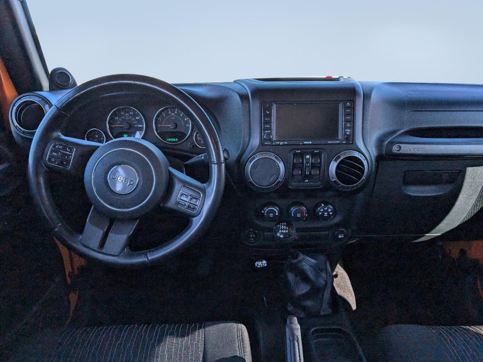 2012 /Black Interior Jeep Wrangler Unlimited Sport (1C4BJWDG0CL) with an Gas V6 3.6L/220 engine, 6-Speed Manual transmission, located at 3959 U.S. 80 W, Phenix City, AL, 36870, (334) 297-4885, 32.469296, -85.135185 - 2012 Jeep Wrangler Unlimited Sport - Photo#14