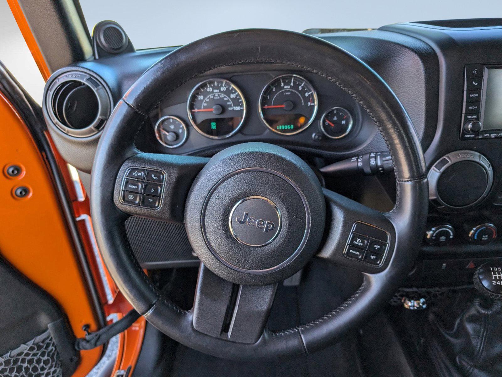 2012 /Black Interior Jeep Wrangler Unlimited Sport (1C4BJWDG0CL) with an Gas V6 3.6L/220 engine, 6-Speed Manual transmission, located at 3959 U.S. 80 W, Phenix City, AL, 36870, (334) 297-4885, 32.469296, -85.135185 - 2012 Jeep Wrangler Unlimited Sport - Photo#16