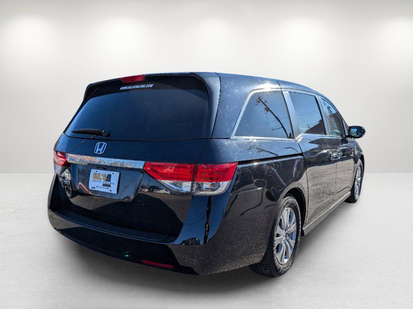 2014 Honda Odyssey EX-L (5FNRL5H69EB) with an Regular Unleaded V-6 3.5 L/212 engine, 6-Speed Automatic w/OD transmission, located at 1430 Gateway Drive, Opelika, AL, 36801, (334) 239-0944, 32.637871, -85.409790 - 2014 Honda Odyssey EX-L - Photo#4