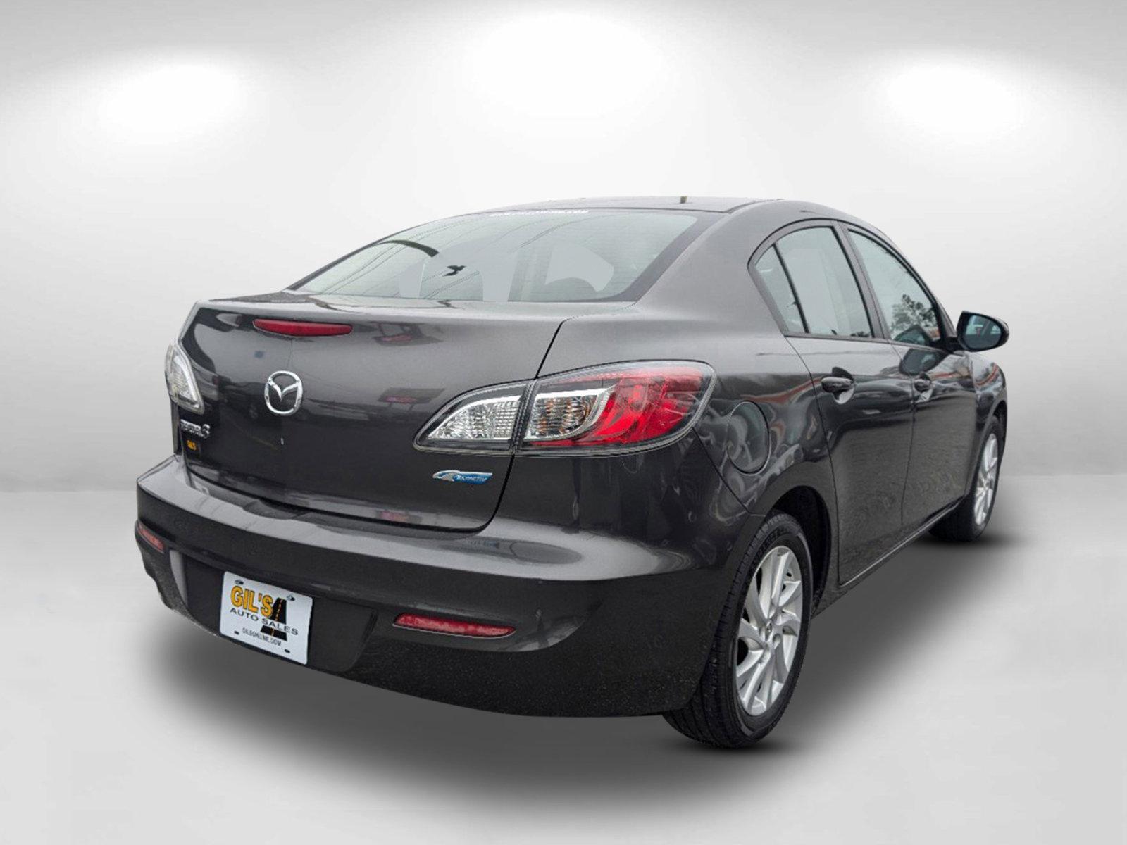 2012 /Black Mazda Mazda3 i Touring (JM1BL1V84C1) with an Gas I4 2.0L/122 engine, 6-Speed Automatic transmission, located at 1430 Gateway Drive, Opelika, AL, 36801, (334) 239-0944, 32.637871, -85.409790 - 2012 Mazda Mazda3 i Touring - Photo#4