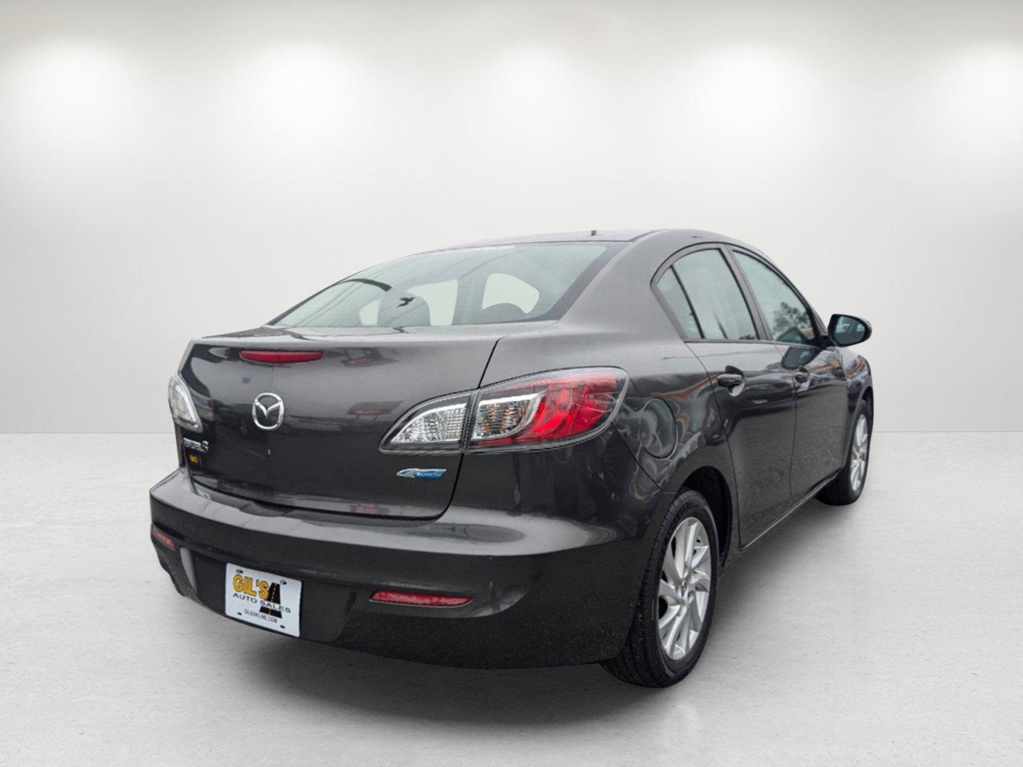 2012 /Black Mazda Mazda3 i Touring (JM1BL1V84C1) with an Gas I4 2.0L/122 engine, 6-Speed Automatic transmission, located at 804 22nd Ave, Phenix City, AL, 36870, (334) 297-1860, 32.484749, -85.024475 - 2012 Mazda Mazda3 i Touring - Photo#4