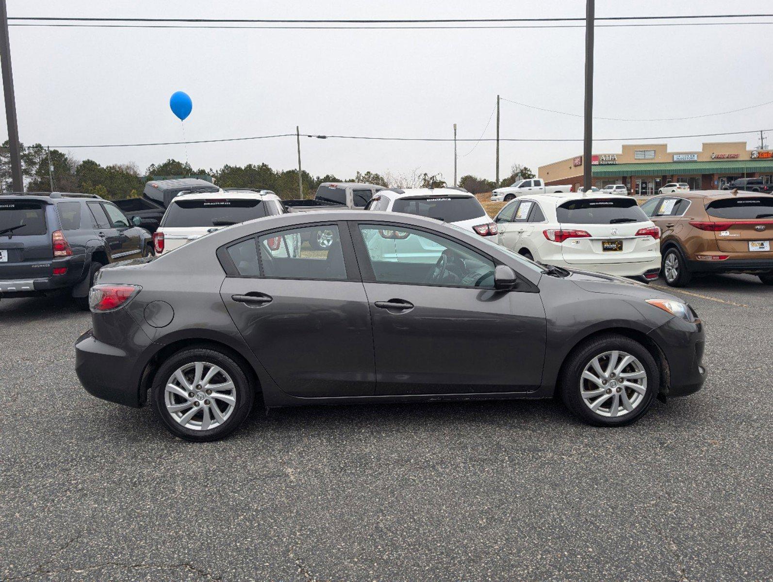 2012 /Black Mazda Mazda3 i Touring (JM1BL1V84C1) with an Gas I4 2.0L/122 engine, 6-Speed Automatic transmission, located at 3959 U.S. 80 W, Phenix City, AL, 36870, (334) 297-4885, 32.469296, -85.135185 - 2012 Mazda Mazda3 i Touring - Photo#3