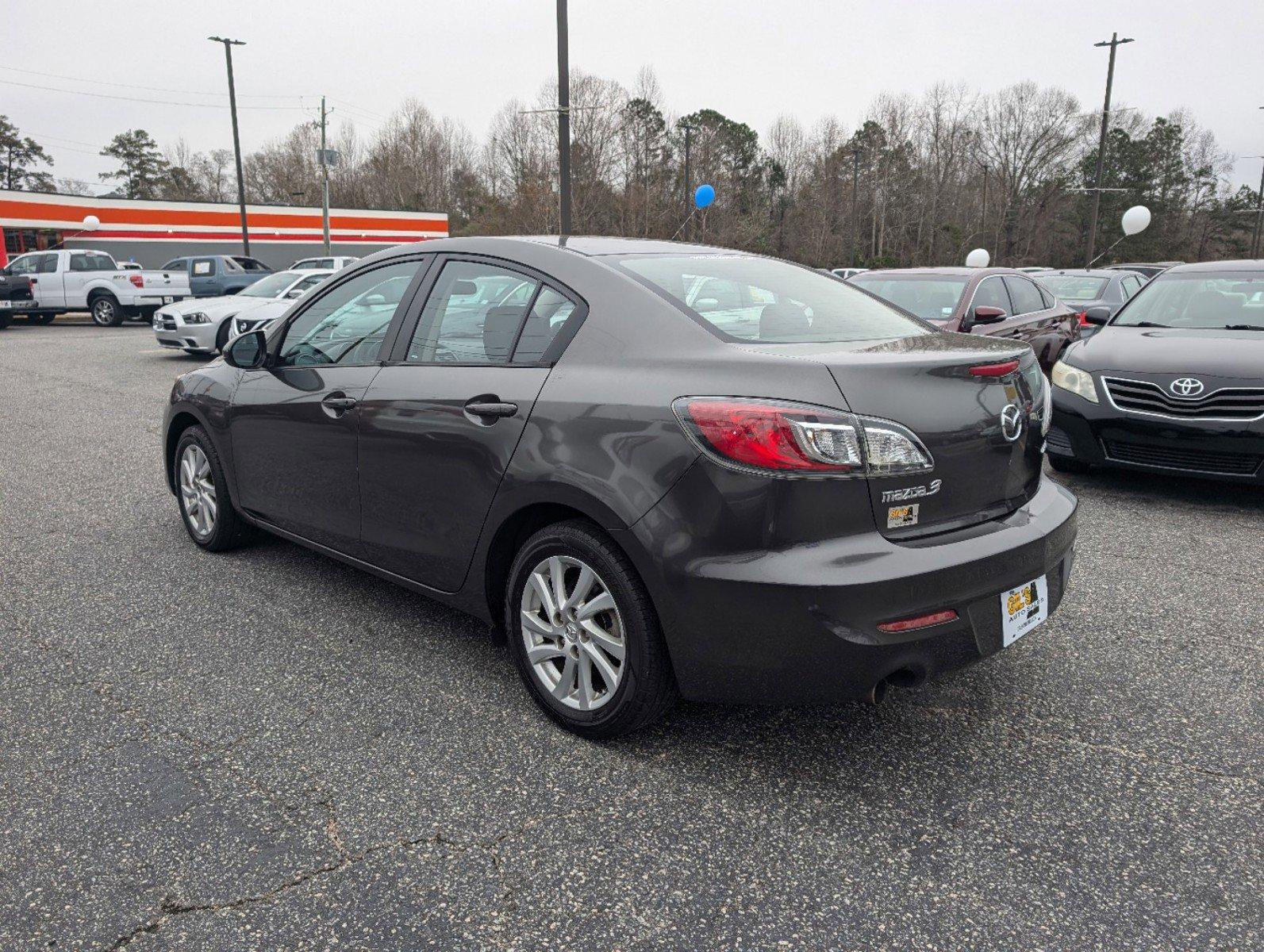 2012 /Black Mazda Mazda3 i Touring (JM1BL1V84C1) with an Gas I4 2.0L/122 engine, 6-Speed Automatic transmission, located at 3959 U.S. 80 W, Phenix City, AL, 36870, (334) 297-4885, 32.469296, -85.135185 - 2012 Mazda Mazda3 i Touring - Photo#6