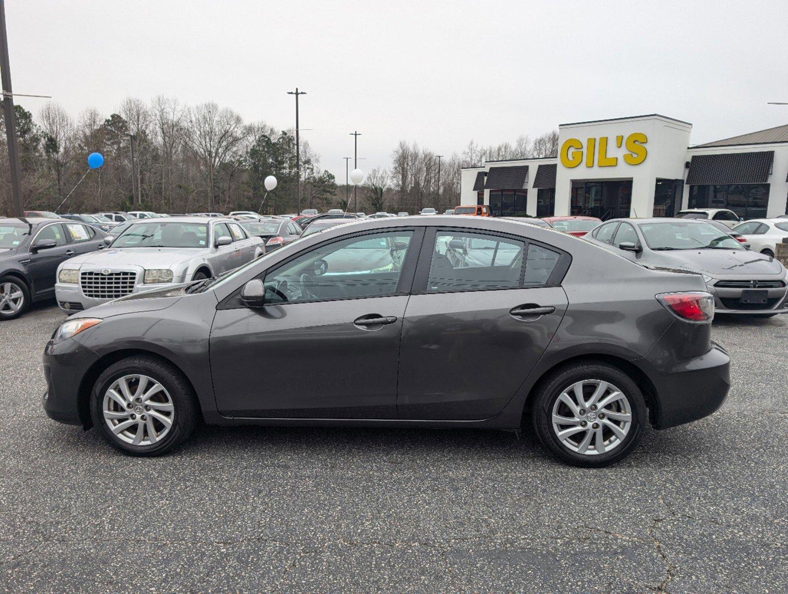 2012 /Black Mazda Mazda3 i Touring (JM1BL1V84C1) with an Gas I4 2.0L/122 engine, 6-Speed Automatic transmission, located at 3959 U.S. 80 W, Phenix City, AL, 36870, (334) 297-4885, 32.469296, -85.135185 - 2012 Mazda Mazda3 i Touring - Photo#7