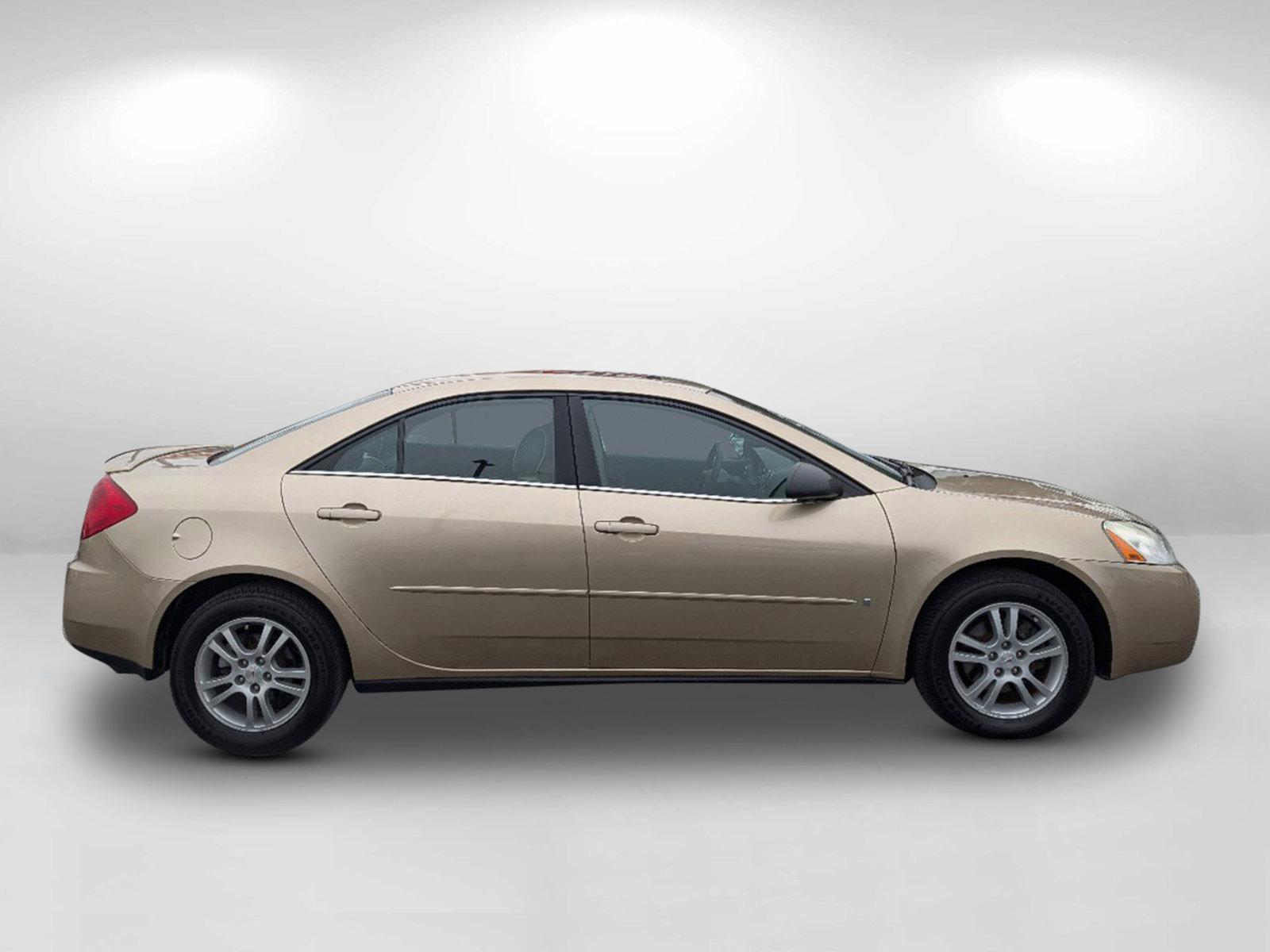 2006 /Light Taupe Pontiac G6 6-Cyl (1G2ZG558264) with an Gas V6 3.5L/213 engine, 4-Speed Automatic w/OD transmission, located at 7000 Northlake Connector, Columbus, GA, 31904, (706) 987-8085, 32.524975, -84.978134 - 2006 Pontiac G6 6-Cyl - Photo#3