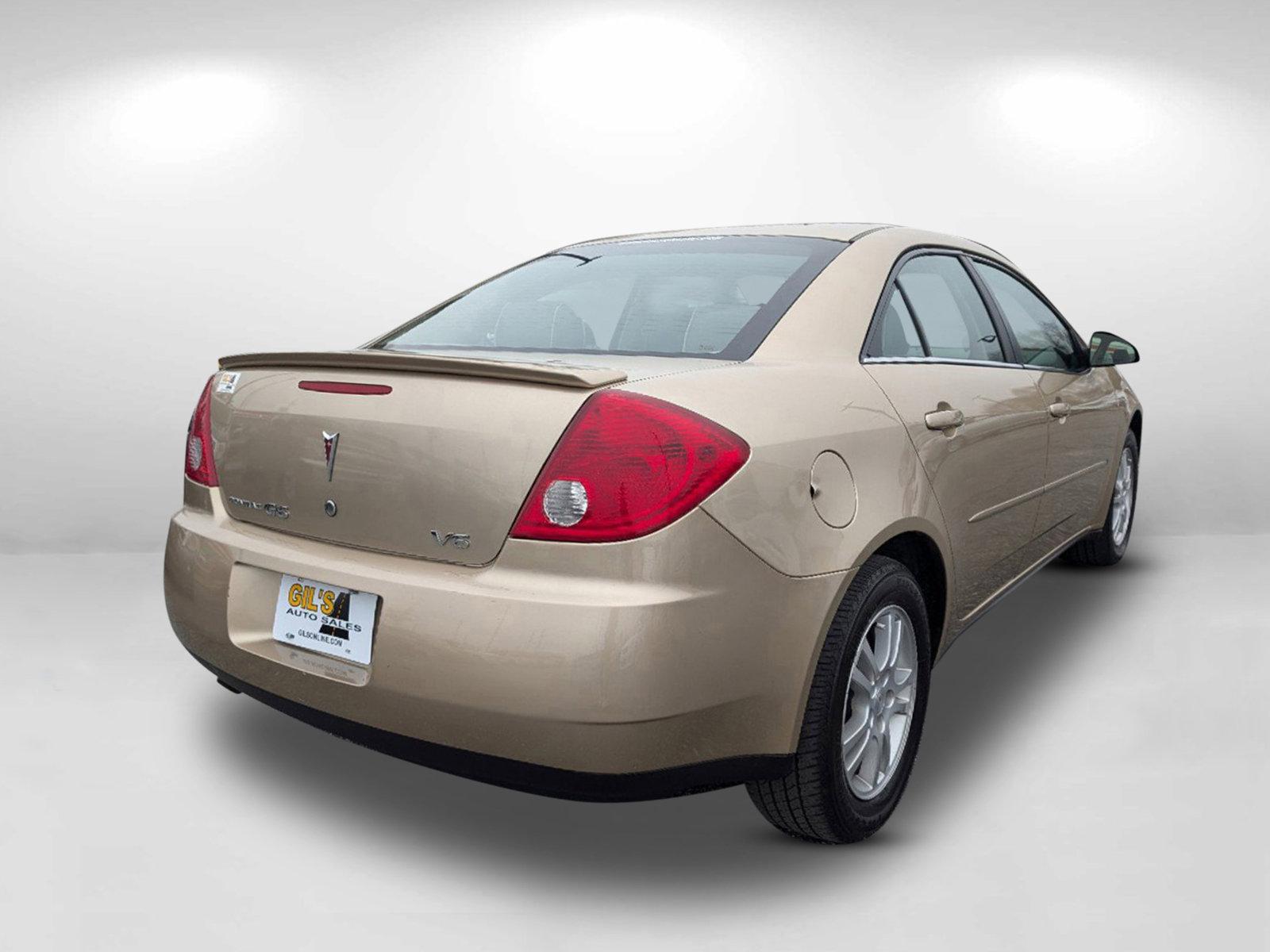 2006 /Light Taupe Pontiac G6 6-Cyl (1G2ZG558264) with an Gas V6 3.5L/213 engine, 4-Speed Automatic w/OD transmission, located at 7000 Northlake Connector, Columbus, GA, 31904, (706) 987-8085, 32.524975, -84.978134 - 2006 Pontiac G6 6-Cyl - Photo#4