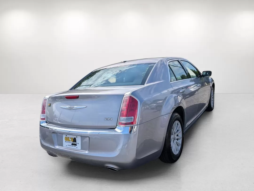 2014 /Black Chrysler 300 (2C3CCAAG5EH) with an Other engine, located at 3959 U.S. 80 W, Phenix City, AL, 36870, (334) 297-4885, 32.469296, -85.135185 - **Experience the Perfect Blend of Style and Comfort with the 2014 Chrysler 300 at Gils Auto!**<br /> <br /> Are you in the market for a sophisticated sedan that effortlessly combines luxury with practicality? Look no further than this stunning 2014 Chrysler 300, available now at Gils Auto in Phenix - Photo#5