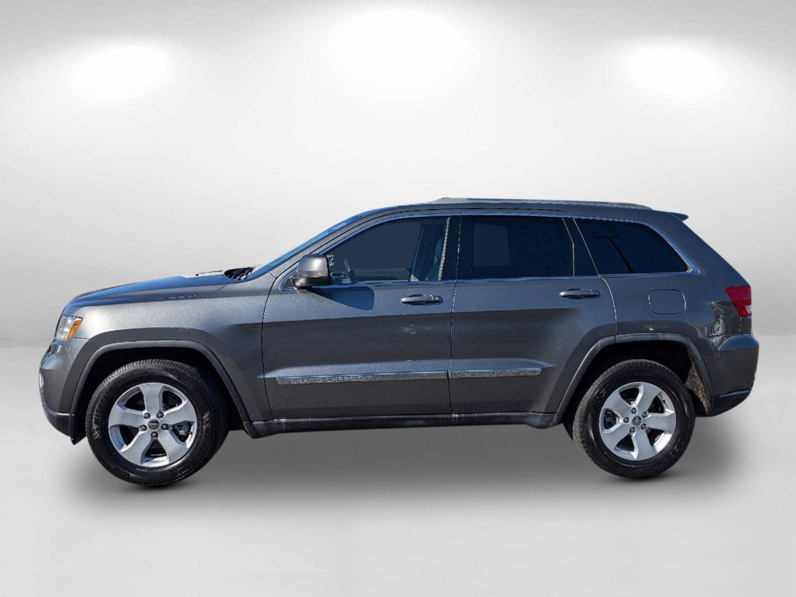 2011 /Dark Graystone/Medium Graystone Interior Jeep Grand Cherokee Laredo (1J4RS4GG8BC) with an Gas/Ethanol V6 3.6L/220 engine, 5-Speed Automatic transmission, located at 1430 Gateway Drive, Opelika, AL, 36801, (334) 239-0944, 32.637871, -85.409790 - 2011 Jeep Grand Cherokee Laredo - Photo#7