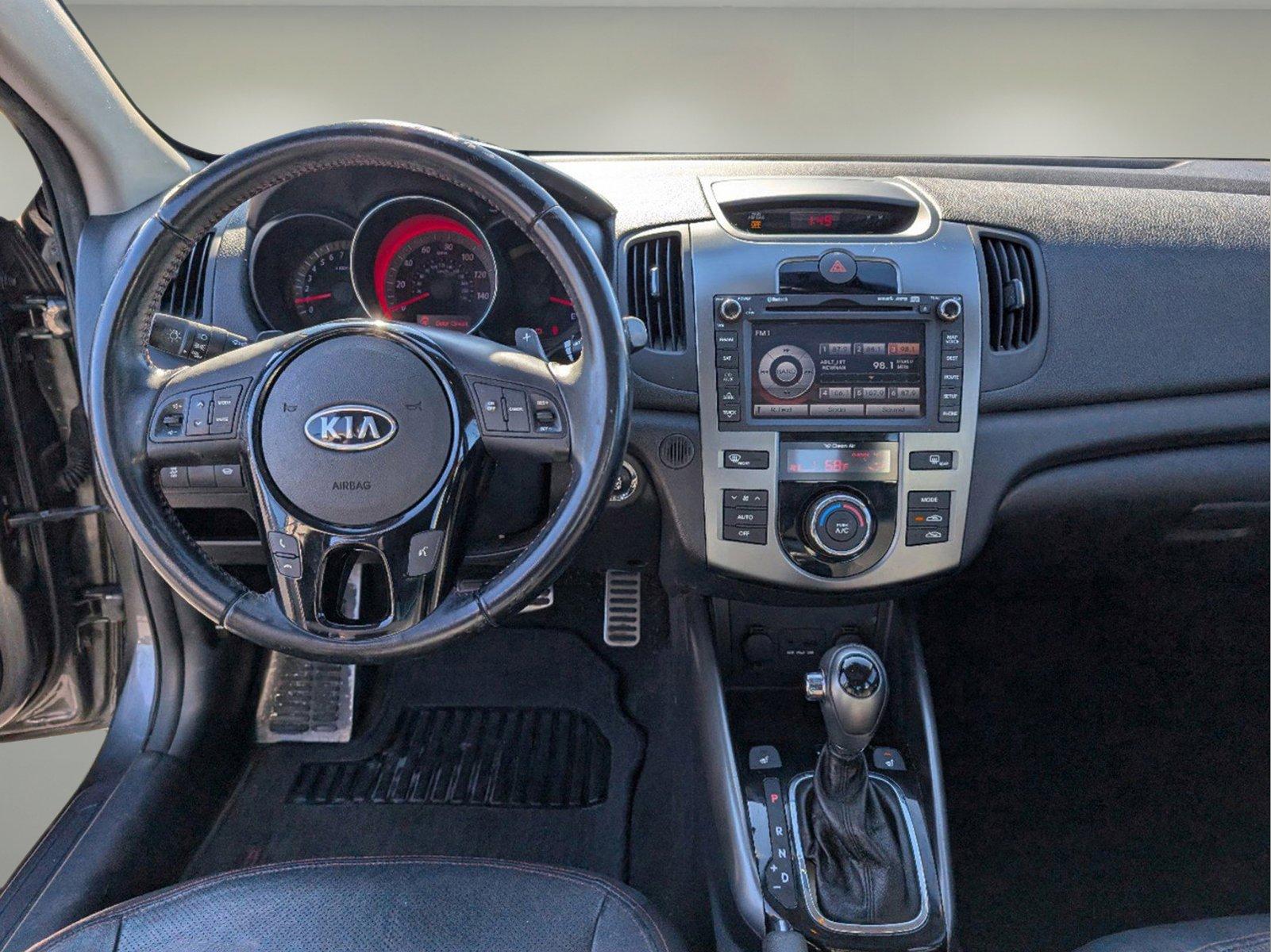 2013 /Black Kia Forte SX (KNAFW4A35D5) with an Gas I4 2.4L/144 engine, 6-Speed Automatic transmission, located at 1430 Gateway Drive, Opelika, AL, 36801, (334) 239-0944, 32.637871, -85.409790 - 2013 Kia Forte SX - Photo#11