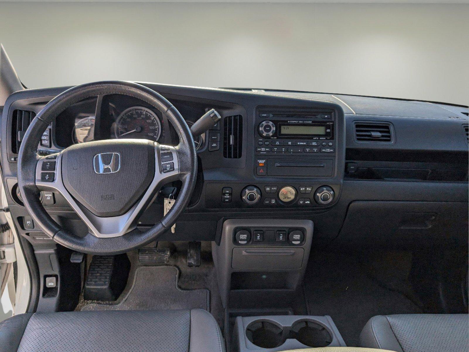 2014 Honda Ridgeline RTL (5FPYK1F50EB) with an Regular Unleaded V-6 3.5 L/212 engine, 5-Speed Automatic w/OD transmission, located at 1430 Gateway Drive, Opelika, AL, 36801, (334) 239-0944, 32.637871, -85.409790 - 2014 Honda Ridgeline RTL - Photo#11