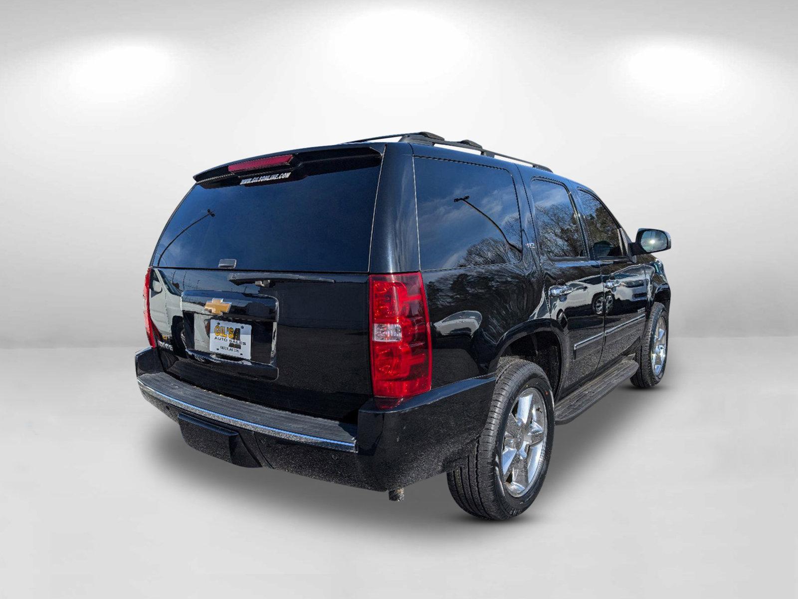 2014 /Light Cashmere/Dark Cashmere Chevrolet Tahoe LTZ (1GNSCCE0XER) with an Gas/Ethanol V8 5.3L/323 engine, 6-Speed Automatic transmission, located at 1430 Gateway Drive, Opelika, AL, 36801, (334) 239-0944, 32.637871, -85.409790 - 2014 Chevrolet Tahoe LTZ - Photo#8