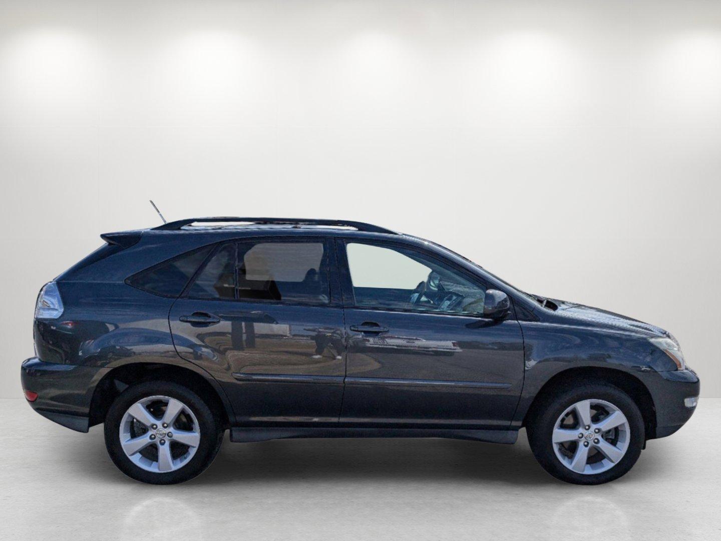 2007 /Black Lexus RX 350 (2T2GK31U37C) with an Gas V6 3.5L/210 engine, 5-Speed Automatic transmission, located at 3959 U.S. 80 W, Phenix City, AL, 36870, (334) 297-4885, 32.469296, -85.135185 - 2007 Lexus RX 350 - Photo#3