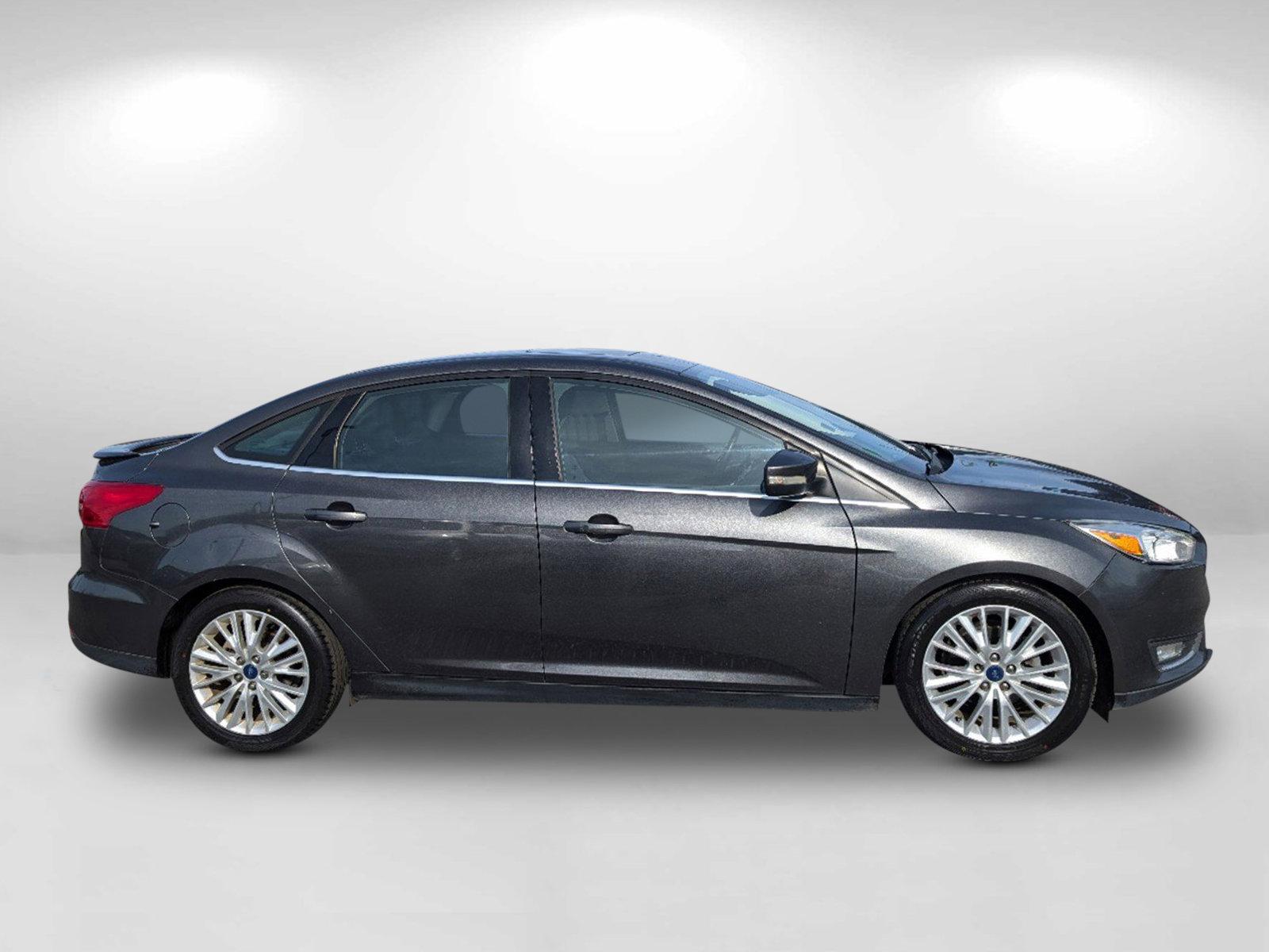 2018 Ford Focus Titanium (1FADP3J28JL) with an Regular Unleaded I-4 2.0 L/122 engine, 6-Speed Auto-Shift Manual w/OD transmission, located at 3959 U.S. 80 W, Phenix City, AL, 36870, (334) 297-4885, 32.469296, -85.135185 - 2018 Ford Focus Titanium - Photo#5