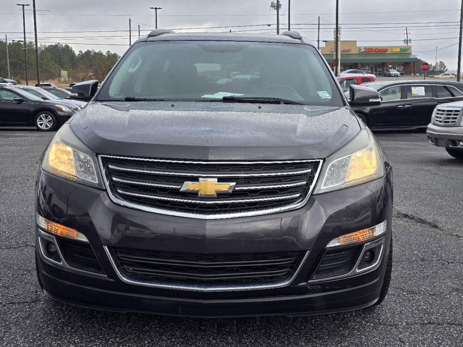 2016 /Ebony Chevrolet Traverse LT (1GNKRHKD3GJ) with an Gas V6 3.6L/217 engine, 6-Speed Automatic transmission, located at 3959 U.S. 80 W, Phenix City, AL, 36870, (334) 297-4885, 32.469296, -85.135185 - 2016 Chevrolet Traverse LT - Photo#1