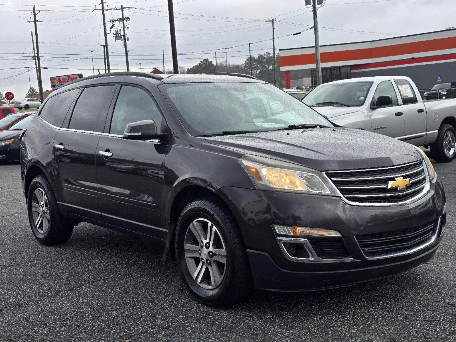 2016 /Ebony Chevrolet Traverse LT (1GNKRHKD3GJ) with an Gas V6 3.6L/217 engine, 6-Speed Automatic transmission, located at 3959 U.S. 80 W, Phenix City, AL, 36870, (334) 297-4885, 32.469296, -85.135185 - 2016 Chevrolet Traverse LT - Photo#2