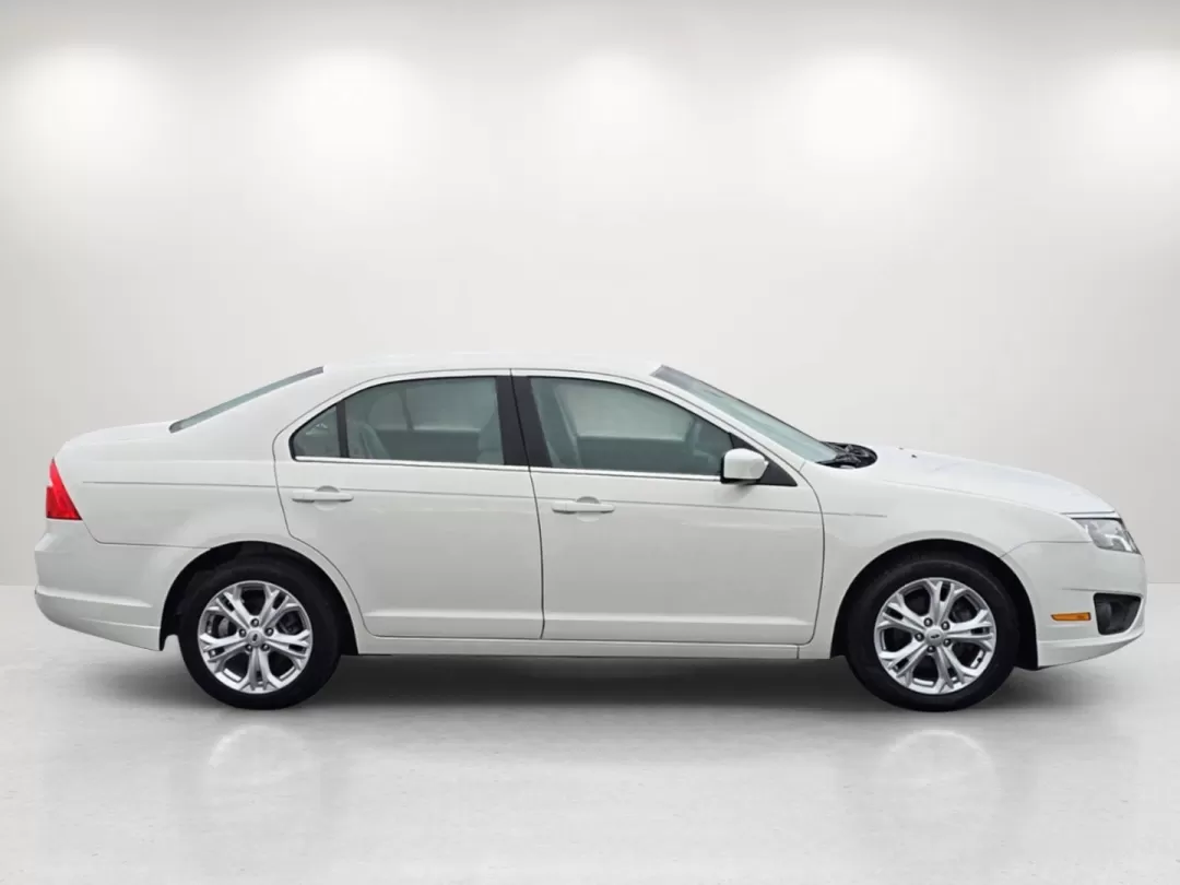 2012 Ford Fusion SE (3FAHP0HA7CR) with an Other engine, located at 5115 14th Ave., Columbus, GA, 31904, (706) 323-0345, 32.511494, -84.971046 - Elevate your daily commute or weekend outings with this stunning 2012 Ford Fusion SE, available now at Gils Auto - Columbus #2. This sedan isn't just a vehicle; it's a lifestyle choice for those who prioritize comfort, reliability, and affordability. Perfect for budget-conscious buyers or anyone nav - Photo#3