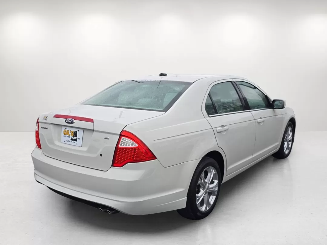 2012 Ford Fusion SE (3FAHP0HA7CR) with an Other engine, located at 5115 14th Ave., Columbus, GA, 31904, (706) 323-0345, 32.511494, -84.971046 - Elevate your daily commute or weekend outings with this stunning 2012 Ford Fusion SE, available now at Gils Auto - Columbus #2. This sedan isn't just a vehicle; it's a lifestyle choice for those who prioritize comfort, reliability, and affordability. Perfect for budget-conscious buyers or anyone nav - Photo#4