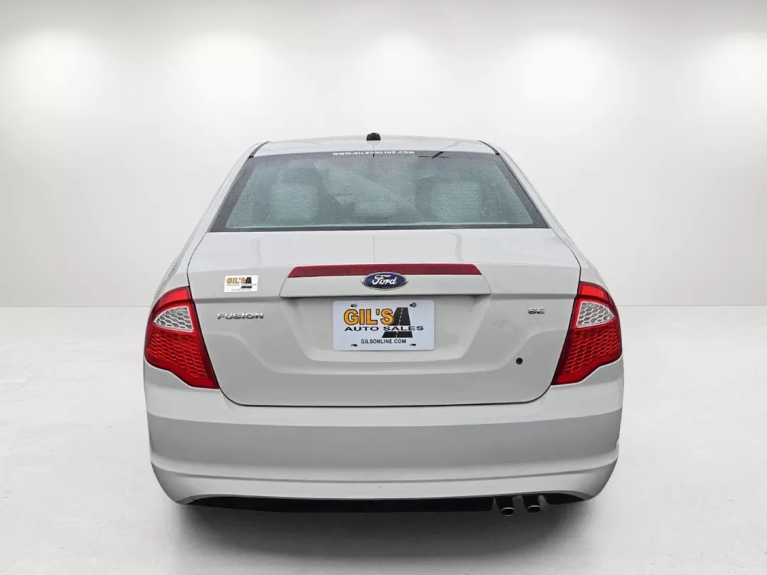 2012 Ford Fusion SE (3FAHP0HA7CR) with an Other engine, located at 5115 14th Ave., Columbus, GA, 31904, (706) 323-0345, 32.511494, -84.971046 - Elevate your daily commute or weekend outings with this stunning 2012 Ford Fusion SE, available now at Gils Auto - Columbus #2. This sedan isn't just a vehicle; it's a lifestyle choice for those who prioritize comfort, reliability, and affordability. Perfect for budget-conscious buyers or anyone nav - Photo#5