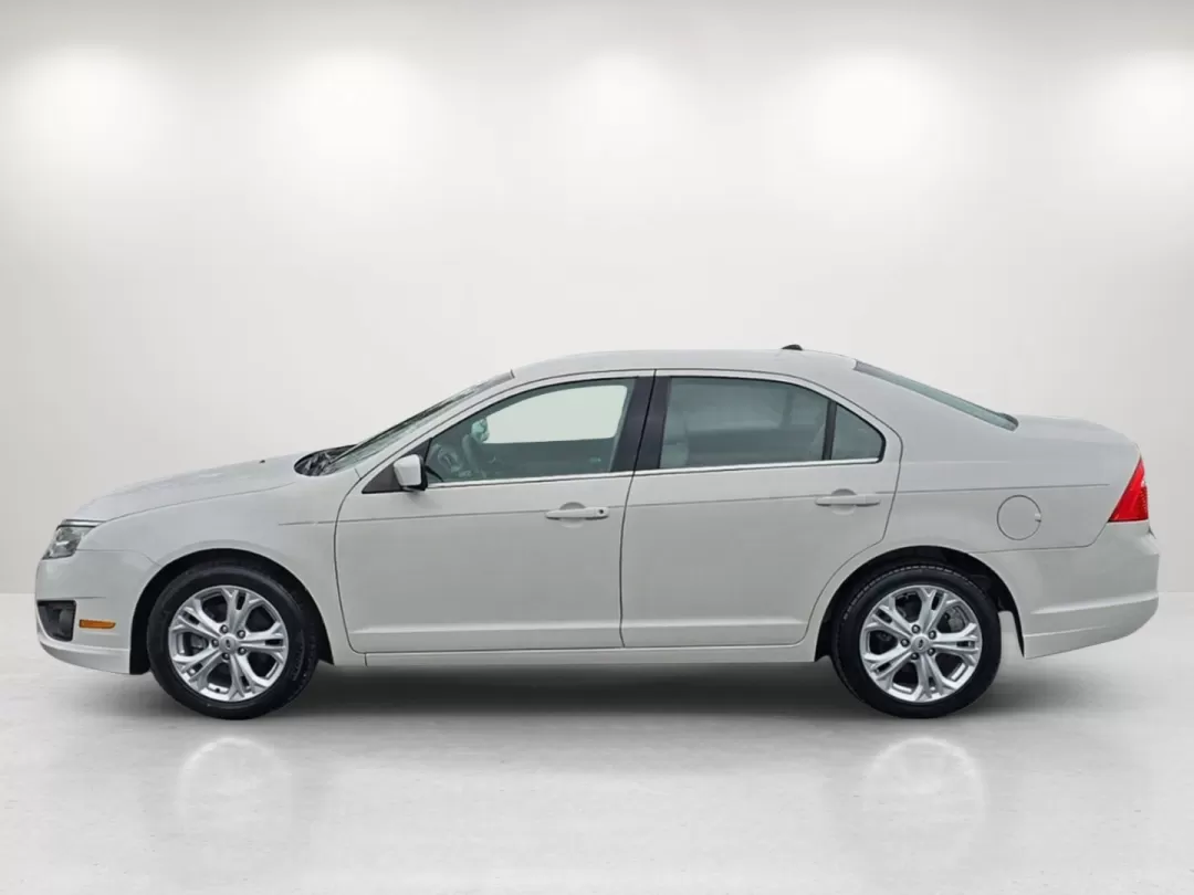 2012 Ford Fusion SE (3FAHP0HA7CR) with an Other engine, located at 5115 14th Ave., Columbus, GA, 31904, (706) 323-0345, 32.511494, -84.971046 - Elevate your daily commute or weekend outings with this stunning 2012 Ford Fusion SE, available now at Gils Auto - Columbus #2. This sedan isn't just a vehicle; it's a lifestyle choice for those who prioritize comfort, reliability, and affordability. Perfect for budget-conscious buyers or anyone nav - Photo#7