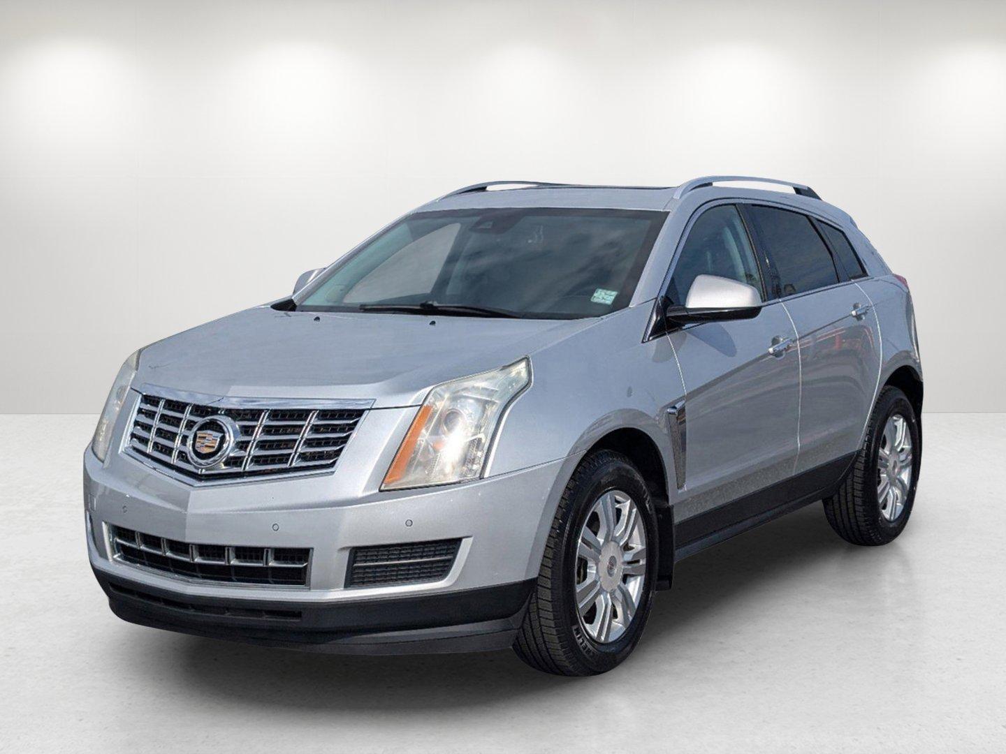 2013 /Ebony w/Ebony accents Cadillac SRX Luxury Collection (3GYFNCE33DS) with an Gas/Ethanol V6 3.6L/217 engine, 6-Speed Automatic w/Manual Shift transmission, located at 1430 Gateway Drive, Opelika, AL, 36801, (334) 239-0944, 32.637871, -85.409790 - 2013 Cadillac SRX Luxury Collection - Photo#0