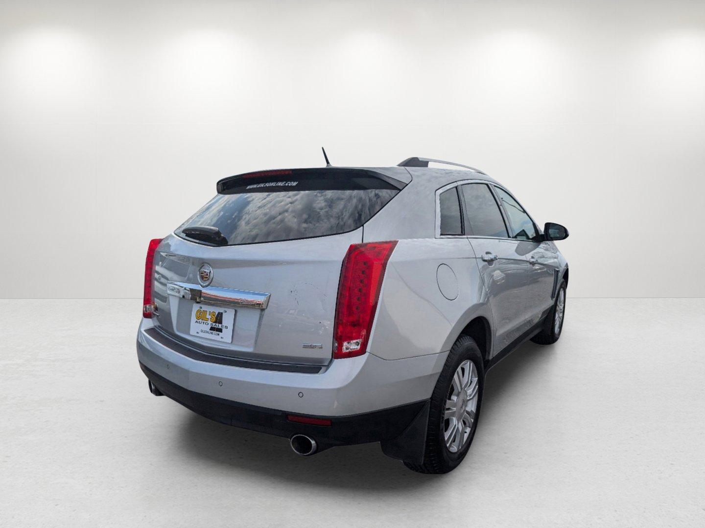 2013 /Ebony w/Ebony accents Cadillac SRX Luxury Collection (3GYFNCE33DS) with an Gas/Ethanol V6 3.6L/217 engine, 6-Speed Automatic w/Manual Shift transmission, located at 1430 Gateway Drive, Opelika, AL, 36801, (334) 239-0944, 32.637871, -85.409790 - 2013 Cadillac SRX Luxury Collection - Photo#4