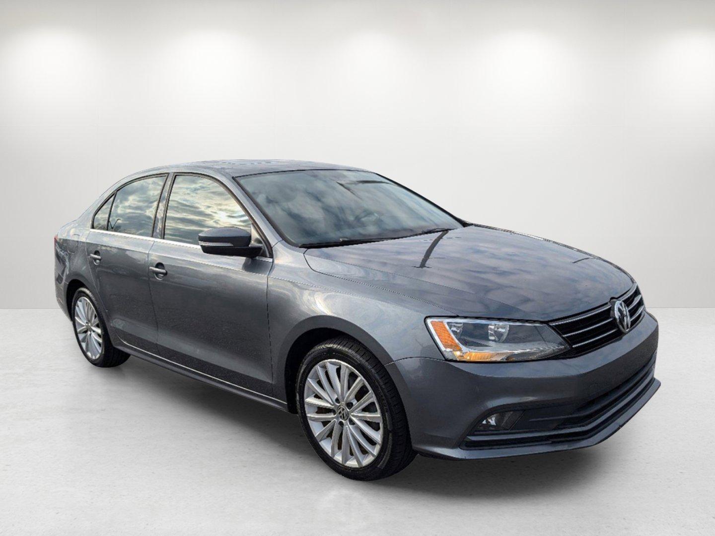 2016 Volkswagen Jetta Sedan (3VWL07AJ9GM) with an Intercooled Turbo Regular Unleaded I-4 1.8 L/110 engine, 6-Speed Automatic w/OD transmission, located at 5115 14th Ave., Columbus, GA, 31904, (706) 323-0345, 32.511494, -84.971046 - 2016 Volkswagen Jetta Sedan - Photo#2