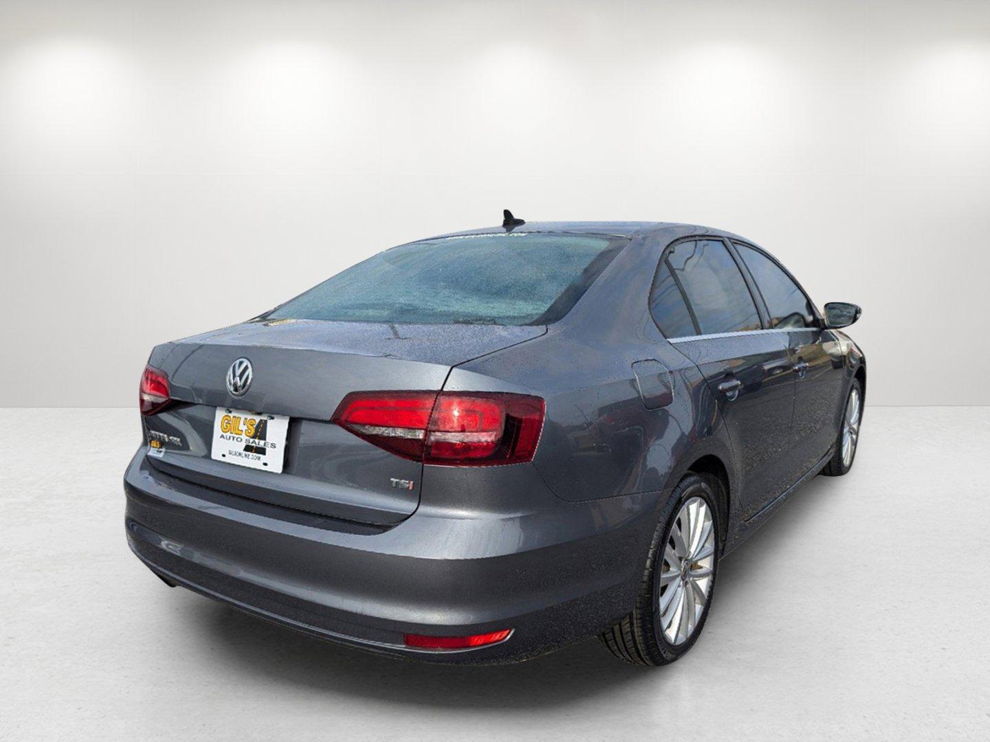 2016 Volkswagen Jetta Sedan (3VWL07AJ9GM) with an Intercooled Turbo Regular Unleaded I-4 1.8 L/110 engine, 6-Speed Automatic w/OD transmission, located at 5115 14th Ave., Columbus, GA, 31904, (706) 323-0345, 32.511494, -84.971046 - 2016 Volkswagen Jetta Sedan - Photo#4