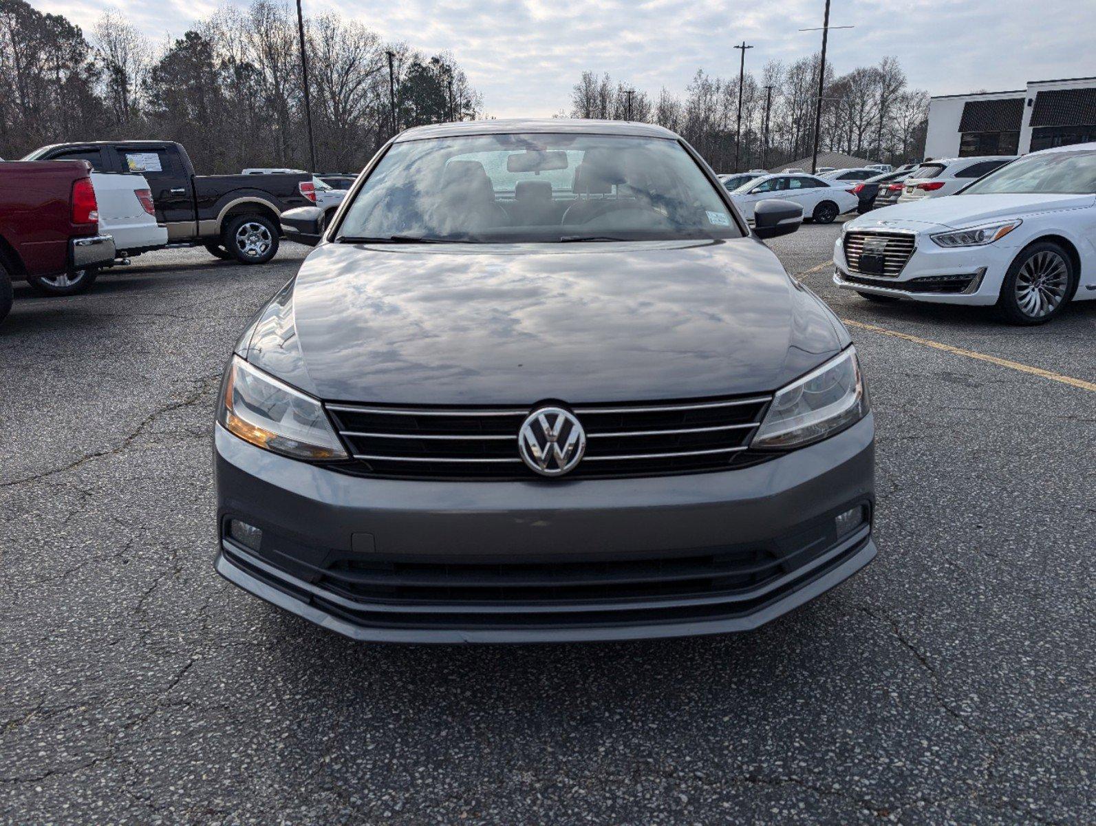 2016 Volkswagen Jetta Sedan (3VWL07AJ9GM) with an Intercooled Turbo Regular Unleaded I-4 1.8 L/110 engine, 6-Speed Automatic w/OD transmission, located at 3959 U.S. 80 W, Phenix City, AL, 36870, (334) 297-4885, 32.469296, -85.135185 - 2016 Volkswagen Jetta Sedan - Photo#1