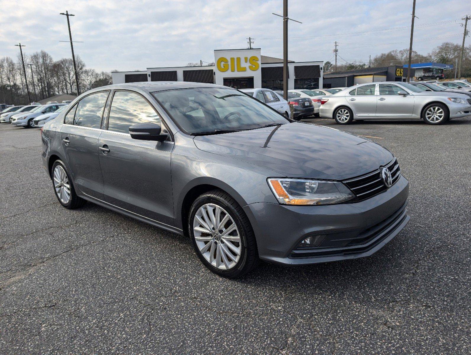 2016 Volkswagen Jetta Sedan (3VWL07AJ9GM) with an Intercooled Turbo Regular Unleaded I-4 1.8 L/110 engine, 6-Speed Automatic w/OD transmission, located at 3959 U.S. 80 W, Phenix City, AL, 36870, (334) 297-4885, 32.469296, -85.135185 - 2016 Volkswagen Jetta Sedan - Photo#2