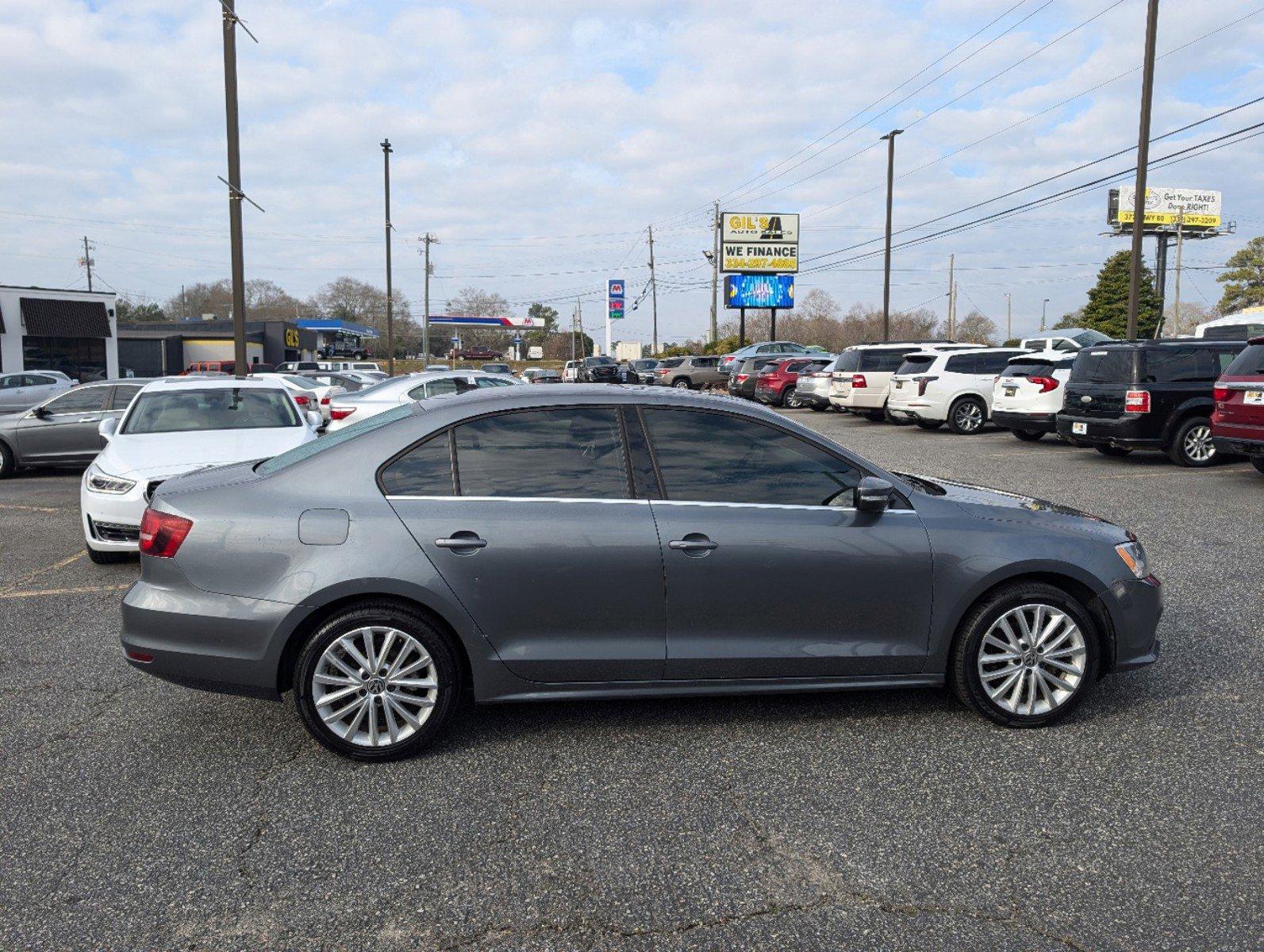 2016 Volkswagen Jetta Sedan (3VWL07AJ9GM) with an Intercooled Turbo Regular Unleaded I-4 1.8 L/110 engine, 6-Speed Automatic w/OD transmission, located at 3959 U.S. 80 W, Phenix City, AL, 36870, (334) 297-4885, 32.469296, -85.135185 - 2016 Volkswagen Jetta Sedan - Photo#3