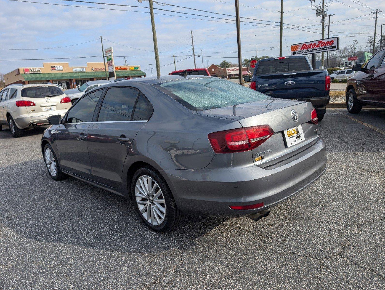 2016 Volkswagen Jetta Sedan (3VWL07AJ9GM) with an Intercooled Turbo Regular Unleaded I-4 1.8 L/110 engine, 6-Speed Automatic w/OD transmission, located at 3959 U.S. 80 W, Phenix City, AL, 36870, (334) 297-4885, 32.469296, -85.135185 - 2016 Volkswagen Jetta Sedan - Photo#6