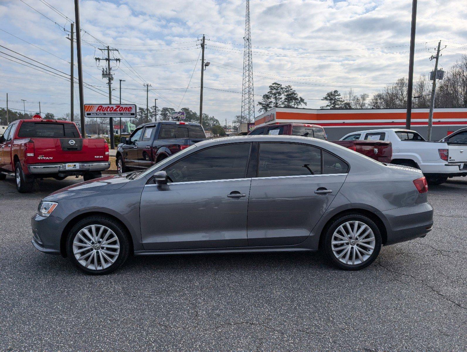 2016 Volkswagen Jetta Sedan (3VWL07AJ9GM) with an Intercooled Turbo Regular Unleaded I-4 1.8 L/110 engine, 6-Speed Automatic w/OD transmission, located at 3959 U.S. 80 W, Phenix City, AL, 36870, (334) 297-4885, 32.469296, -85.135185 - 2016 Volkswagen Jetta Sedan - Photo#7