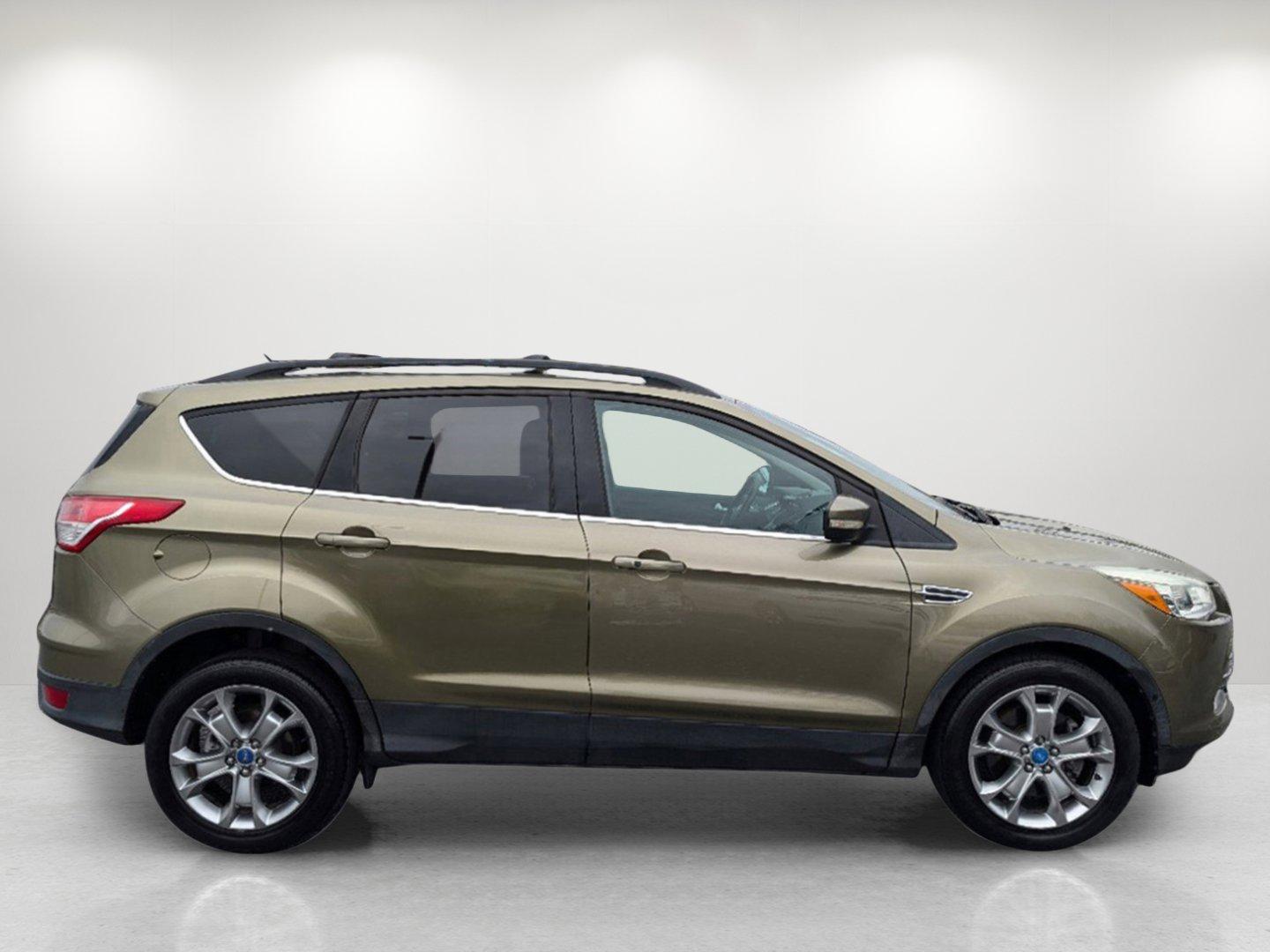 2013 Ford Escape SEL (1FMCU0H98DU) with an Turbocharged Gas I4 2.0L/121 engine, 6-Speed Automatic w/Manual Shift transmission, located at 804 22nd Ave, Phenix City, AL, 36870, (334) 297-1860, 32.484749, -85.024475 - 2013 Ford Escape SEL - Photo#3