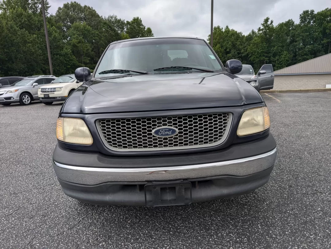 1999 Ford F-150 Work Series (1FTRX17WXXN) with an Other engine, located at 3959 U.S. 80 W, Phenix City, AL, 36870, (334) 297-4885, 32.469296, -85.135185 - **Discover the Perfect Workhorse: 1999 Ford F-150 Work Series at Gils Auto in Phenix City, AL!**<br /> <br /> Are you in need of a reliable pickup truck that can handle your daily tasks while keeping you comfortable on the road? Look no further than this rugged 1999 Ford F-150 Work Series, available - Photo#1